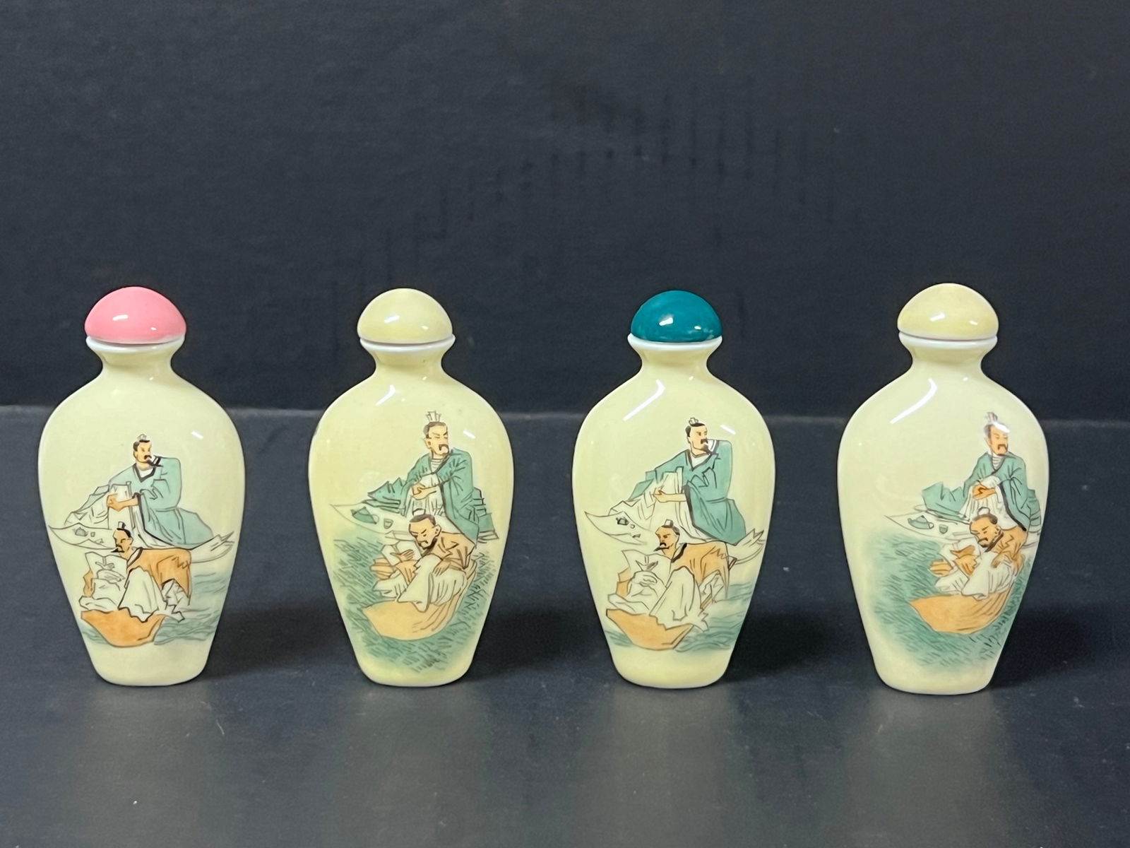 Chinese Art Porcelain Snuff Bottle Set of 4: Chinese Art Porcelain Snuff Bottle Set of 4. The dimension is 3 inches high x 2 inches wide. Please be aware that some of the items are vintage, secondhand, old ages, antiques and may have a defects o