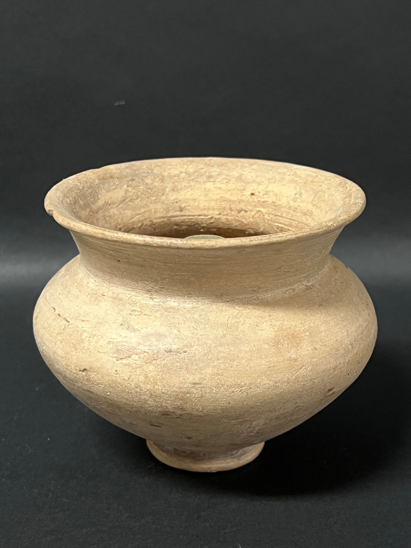 Middle Eastern Pottery Jar: Middle Eastern Art Pottery Jar. The dimension is 4.25 inches high x 5 inches wide. Please be aware that some of the items are vintage, secondhand, old ages, antiques and may have a defects or sign of