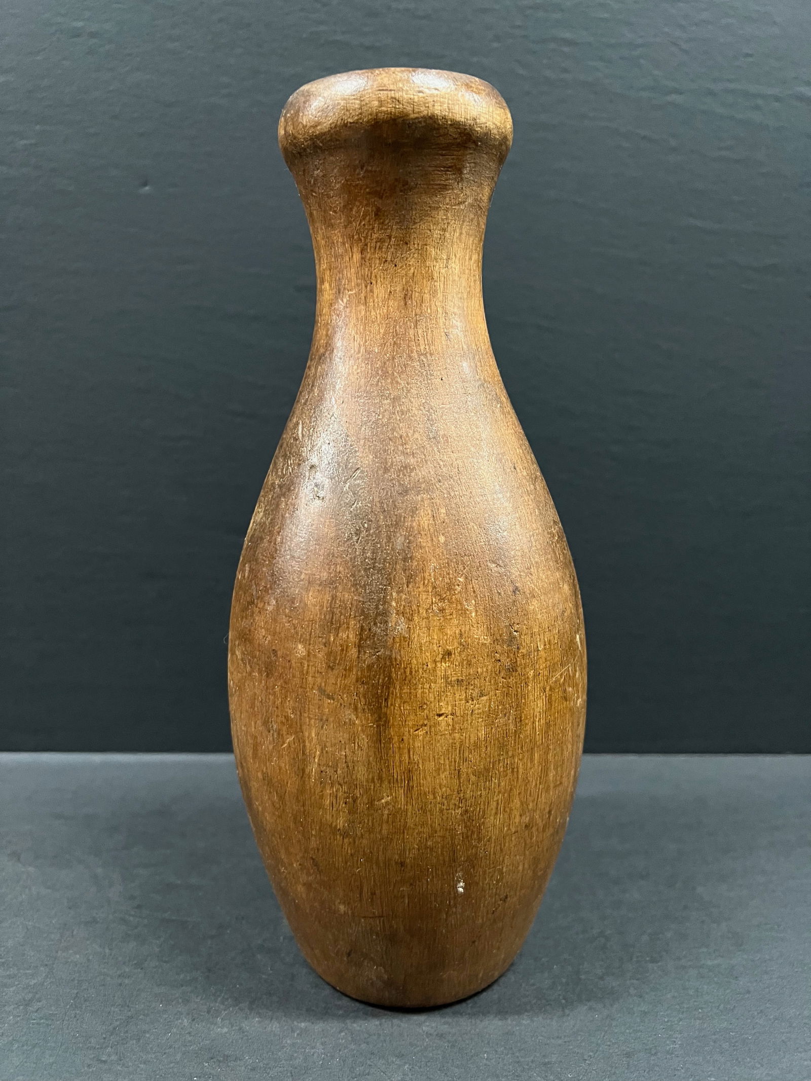 Carved Wood Flower Vase Sculpture: Folk Art Carved Wood Flower Vase Sculpture. The dimension is 8 inches high x 3 inches wide. Please be aware that some of the items are vintage, secondhand, old ages, antiques and may have a defects or