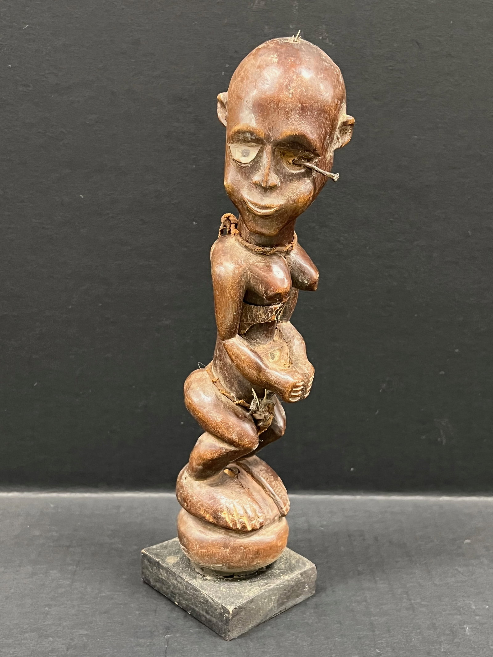 Luba Statue: African Tribal Art Luba Statue. The dimension is 11.75 inches high x 2.5 inches wide. Please be aware that some of the items are vintage, secondhand, old ages, antiques and may have a defects or sign