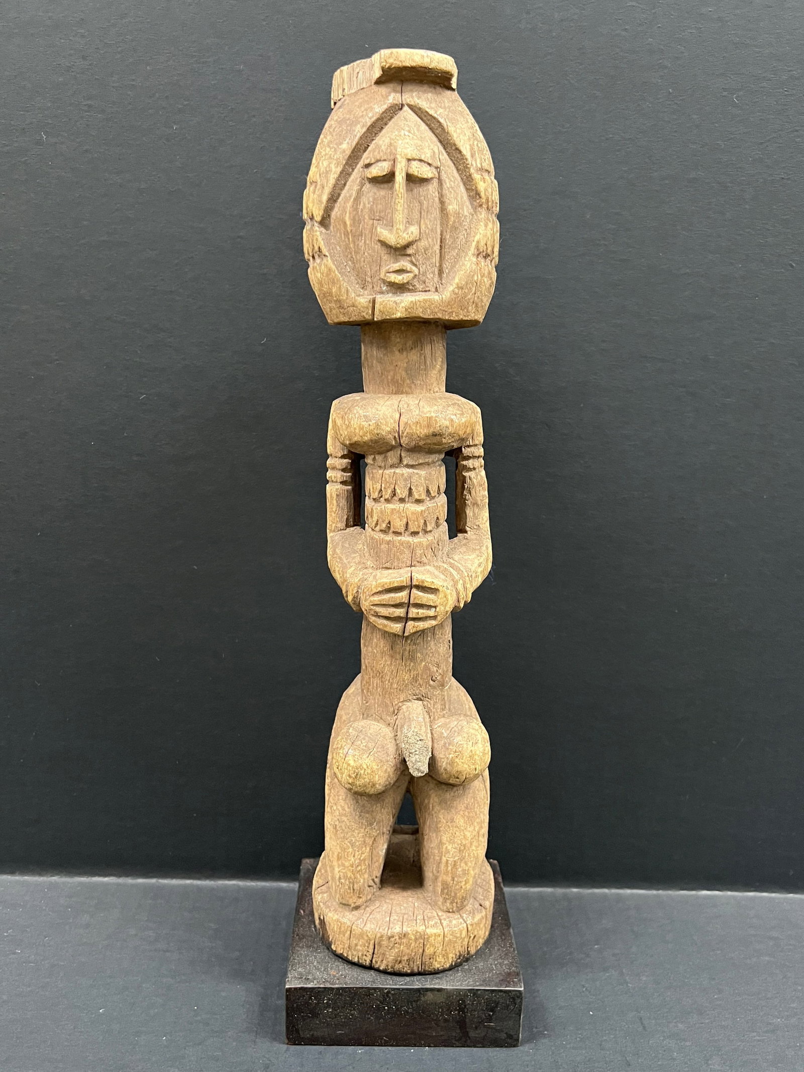 Dogon Statue: African Tribal Art Dogon Statue. The dimension is 18 inches high x 4 inches wide. Please be aware that some of the items are vintage, secondhand, old ages, antiques and may have a defects or sign of a