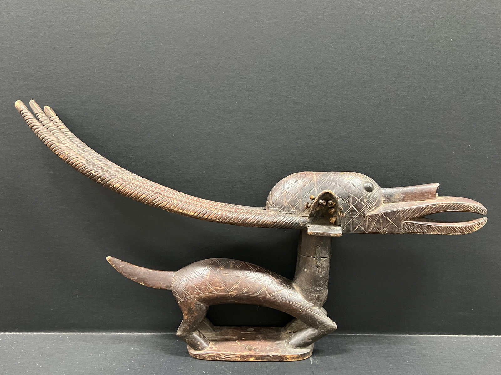 Chiwara Bambara Antelope Headdress: African Tribal Art Chiwara Bambara Antelope Headdress. The dimension is 15.5 inches high x 26 inches wide. Please be aware that some of the items are vintage, secondhand, old ages, antiques and may ha