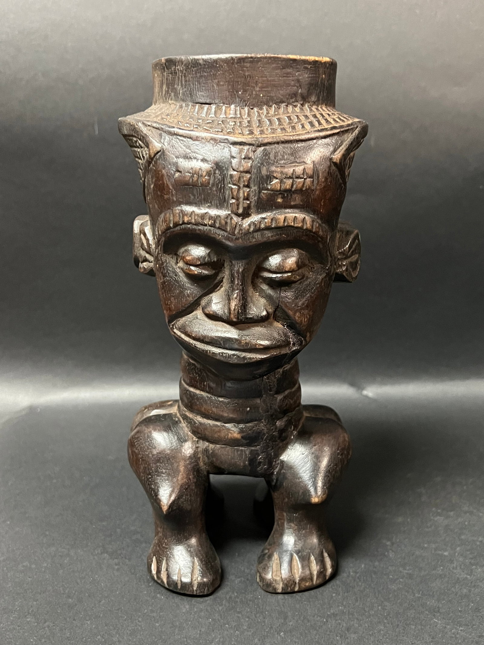 Kuba Cup: African Tribal Art Kuba Cup. The dimension is 9.5 inches high x 4.5 inches wide. Please be aware that some of the items are vintage, secondhand, old ages, antiques and may have a defects or sign of