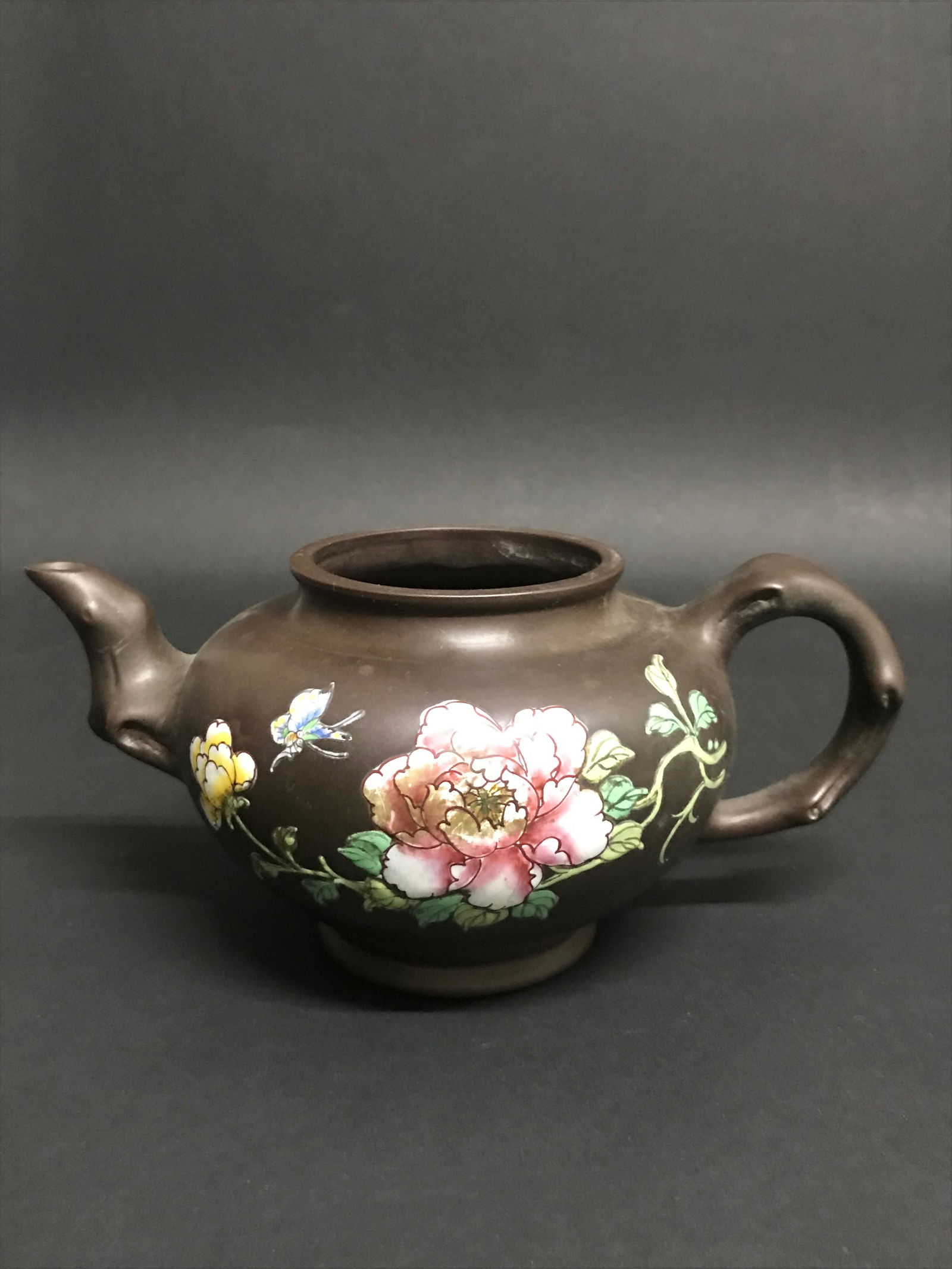 Yixing Clay and Enamel Teapot No Cover: Chinese Art Yixing Clay and Enamel Teapot No Cover. The dimension is 4 inches high x 6 inches wide. Please be aware that some of the items are vintage, secondhand, old ages, antiques and may have a de