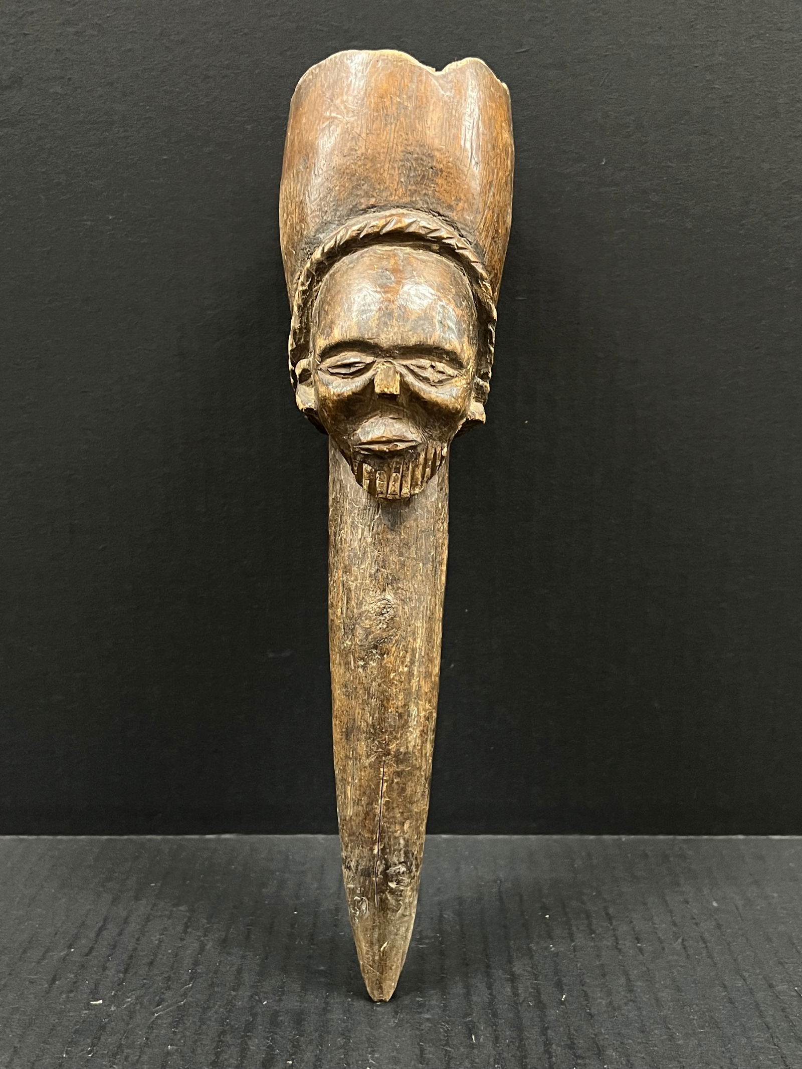 Carved Wood Kuba Medicine Cup: African Tribal Art Carved Wood Kuba Medicine Cup. Dimension is 12.5 inches high x 3.25 inches wide. Please be aware that some of the items are vintage, secondhand, old ages, antiques and may have a de
