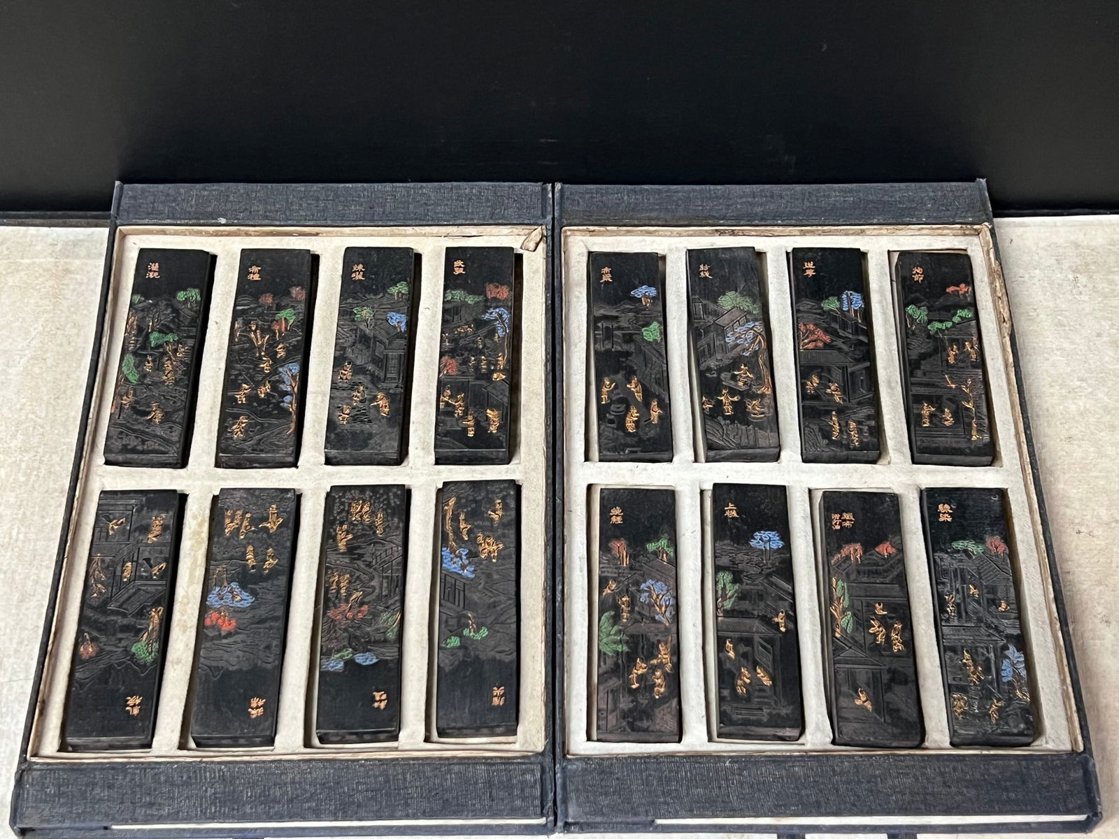 Set of 16 Calligraphy Blank Ink Stick with Landscape and Poem Design: Chinese Art Set of 16 Calligraphy Blank Ink Stick with Landscape and Poem Design and Silk Box Case. The dimension is 4.25 inches high x 1.25 inches wide. Please be aware that some of the items are vin