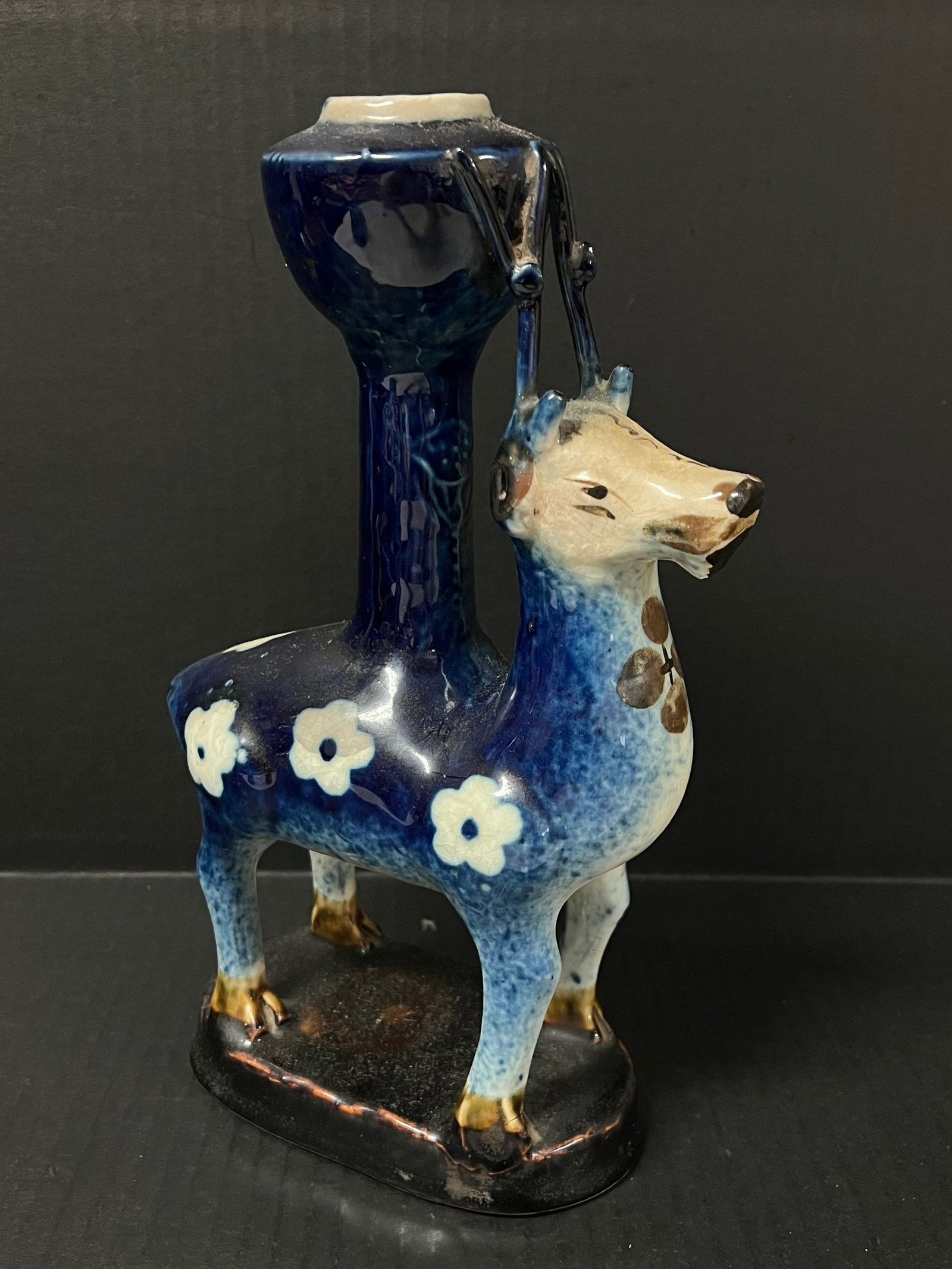 Porcelain Blue and White Candle Holder: Chinese Art Blue and White Candle Holder. The dimension is 11 inches high x 7 inches wide. Please be aware that some of the items are vintage, secondhand, old ages, antiques and may have a defects or