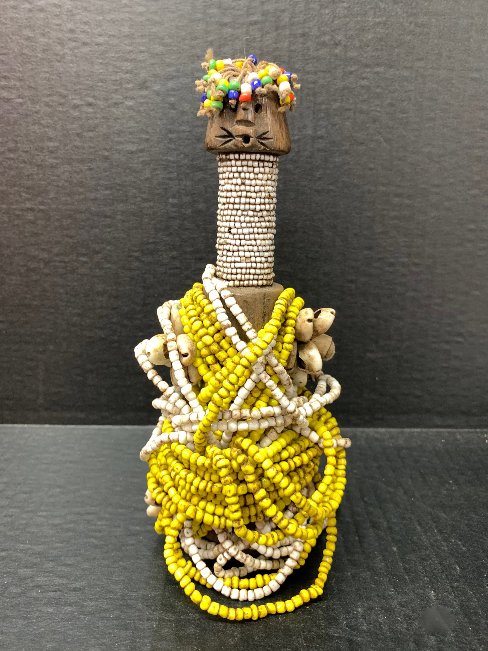 Fali Fertility Beaded Doll: African Tribal Fali Fertility Beaded Doll. The dimension is 7.5 inches high x 3 inches wide. Please be aware that some of the items are vintage, secondhand, old ages, antiques and may have a defects o
