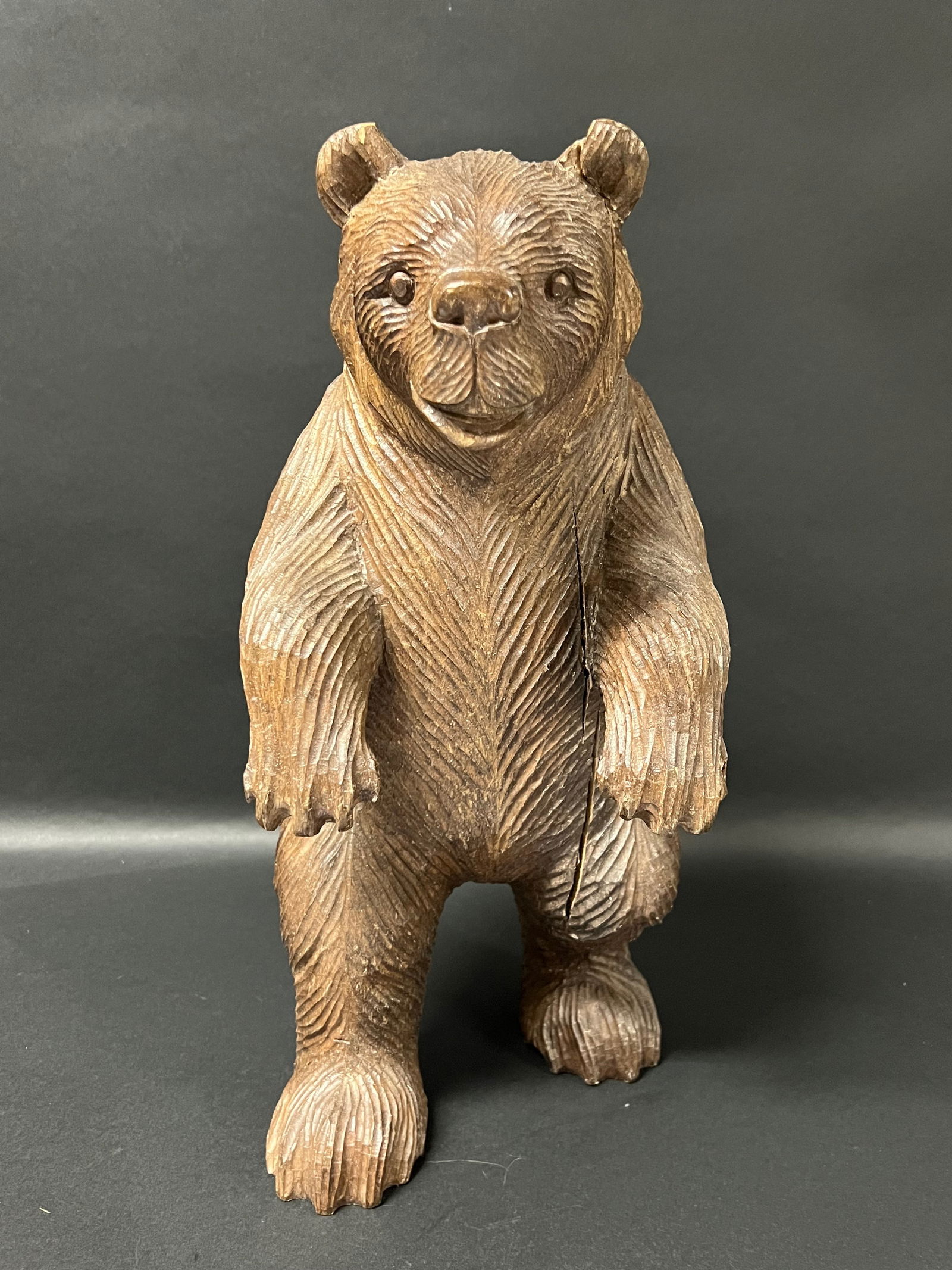 Carved Wood Large Bear Sculpture: Folk Art Carved Wood Large Bear Sculpture. The dimension is 16 inches high x 8 inches wide. Please be aware that some of the items are vintage, secondhand, old ages, antiques and may have a defects or