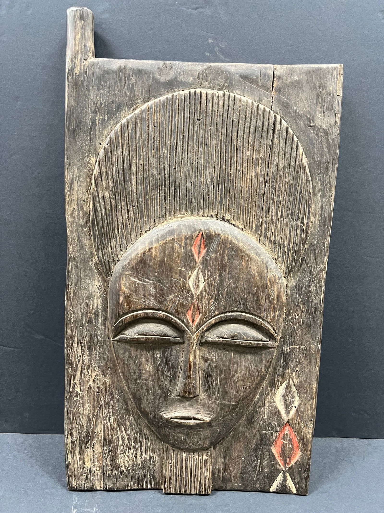 Baule Door: African Tribal Art Baule Door. The dimension is 20 inches high x 13 inches wide. Please be aware that some of the items are vintage, secondhand, old ages, antiques and may have a defects or sign of ag