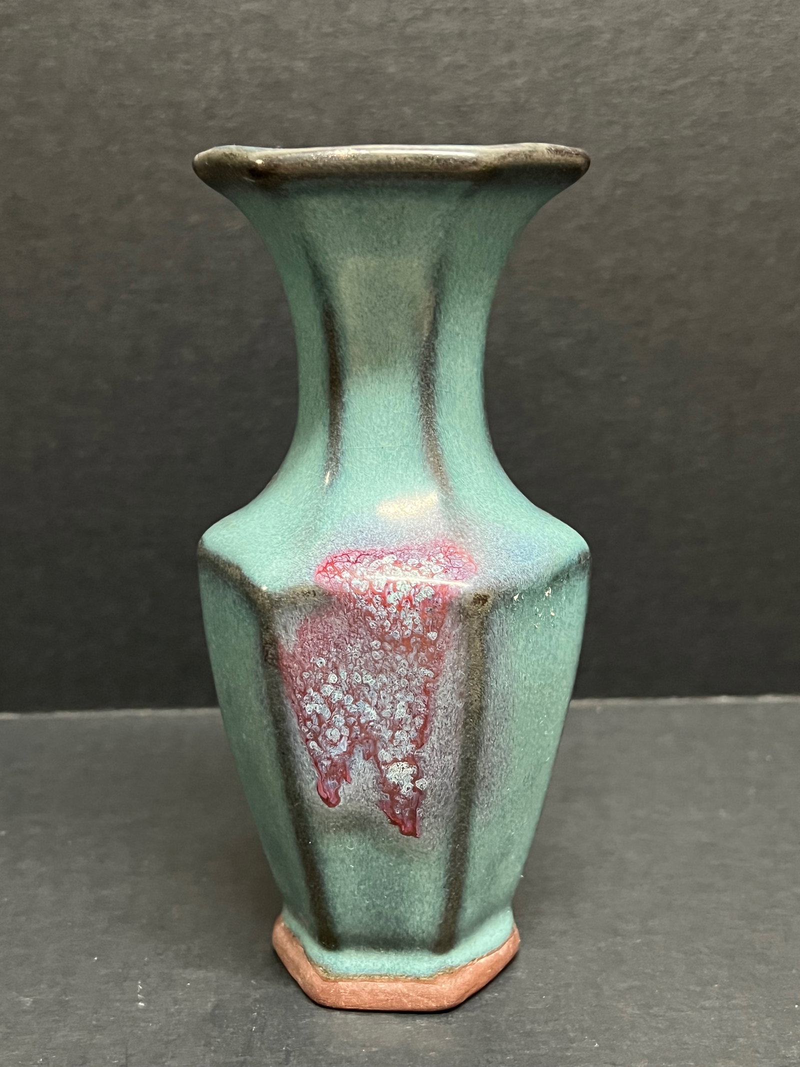 Chinese Art Jun Ware Porcelain Vase: Chinese Art Jun Ware Porcelain Vase. The dimension is 7 inches high x 3 inches wide. Please be aware that some of the items are vintage, secondhand, old ages, antiques and may have a defects or sign o