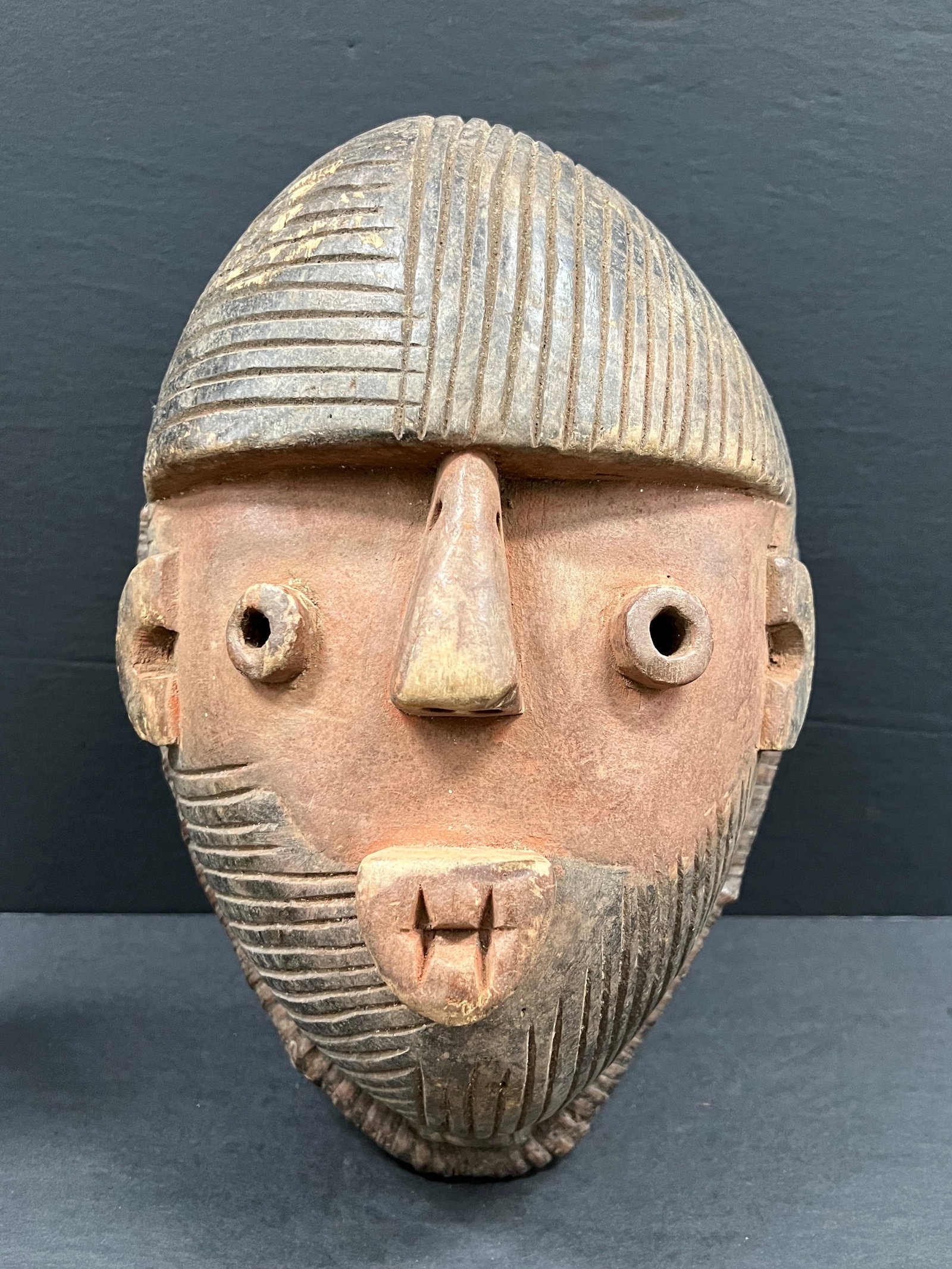 Tabwa Mask: African Tribal Art Tabwa Mask. The dimension is 13.5 inches high x 9.5 inches wide. Please be aware that some of the items are vintage, secondhand, old ages, antiques and may have a defects or sign of
