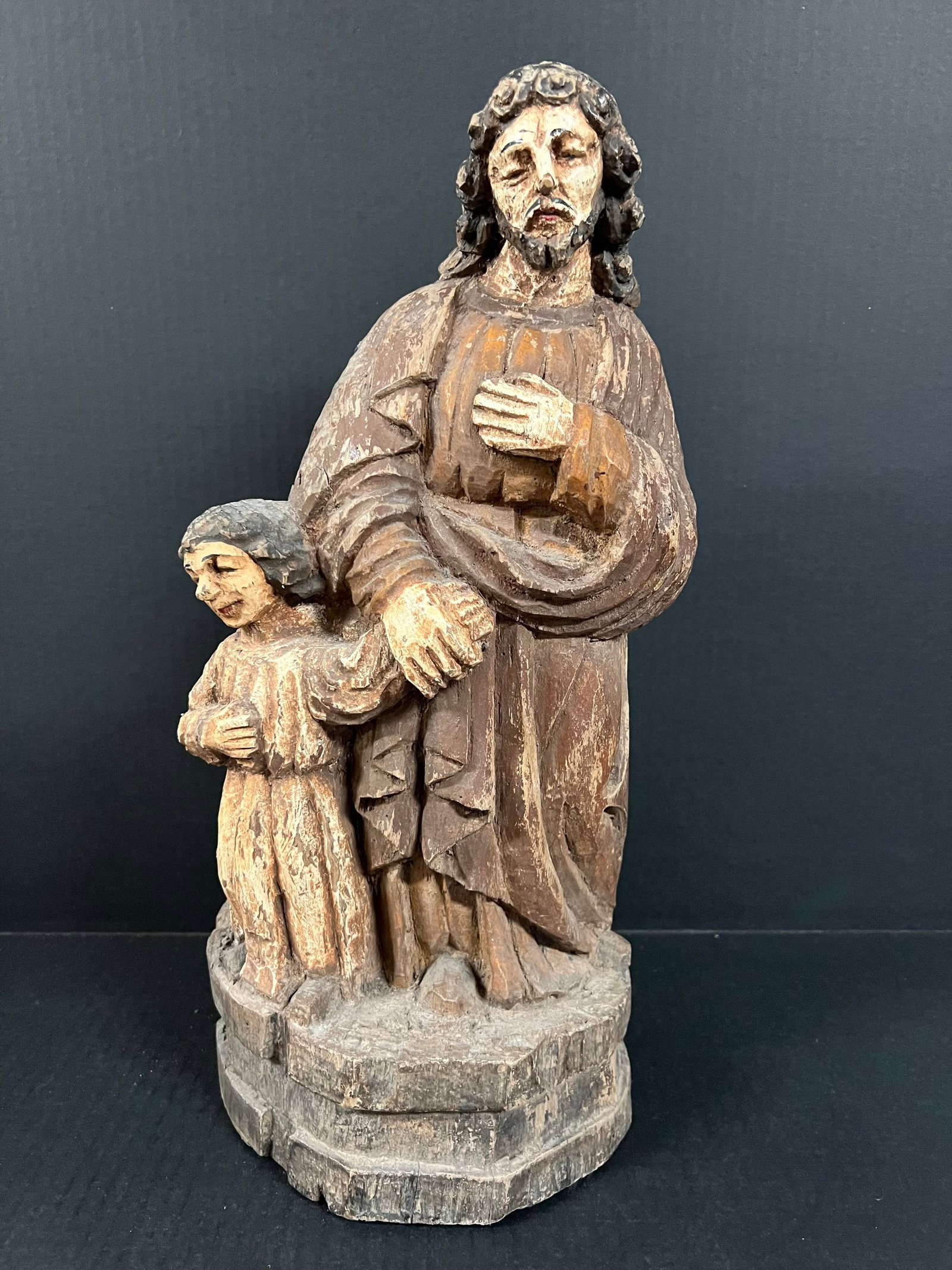 Carved Wood Saint Joseph and Baby Jesus: Religious Art Carved Wood Saint Joseph and Baby Jesus. The dimension is 17 inches high x 8 inches wide. Please be aware that some of the items are vintage, secondhand, old ages, antiques and may have