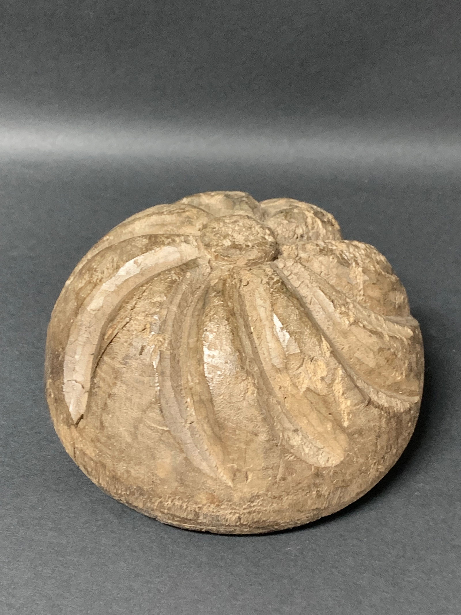 Carved Wood Bread Sculpture: Folk Art Carved Wood Bread Sculpture. The dimension is 3.5 inches high x 6 inches wide. Please be aware that some of the items are vintage, secondhand, old ages, antiques and may have a defects or