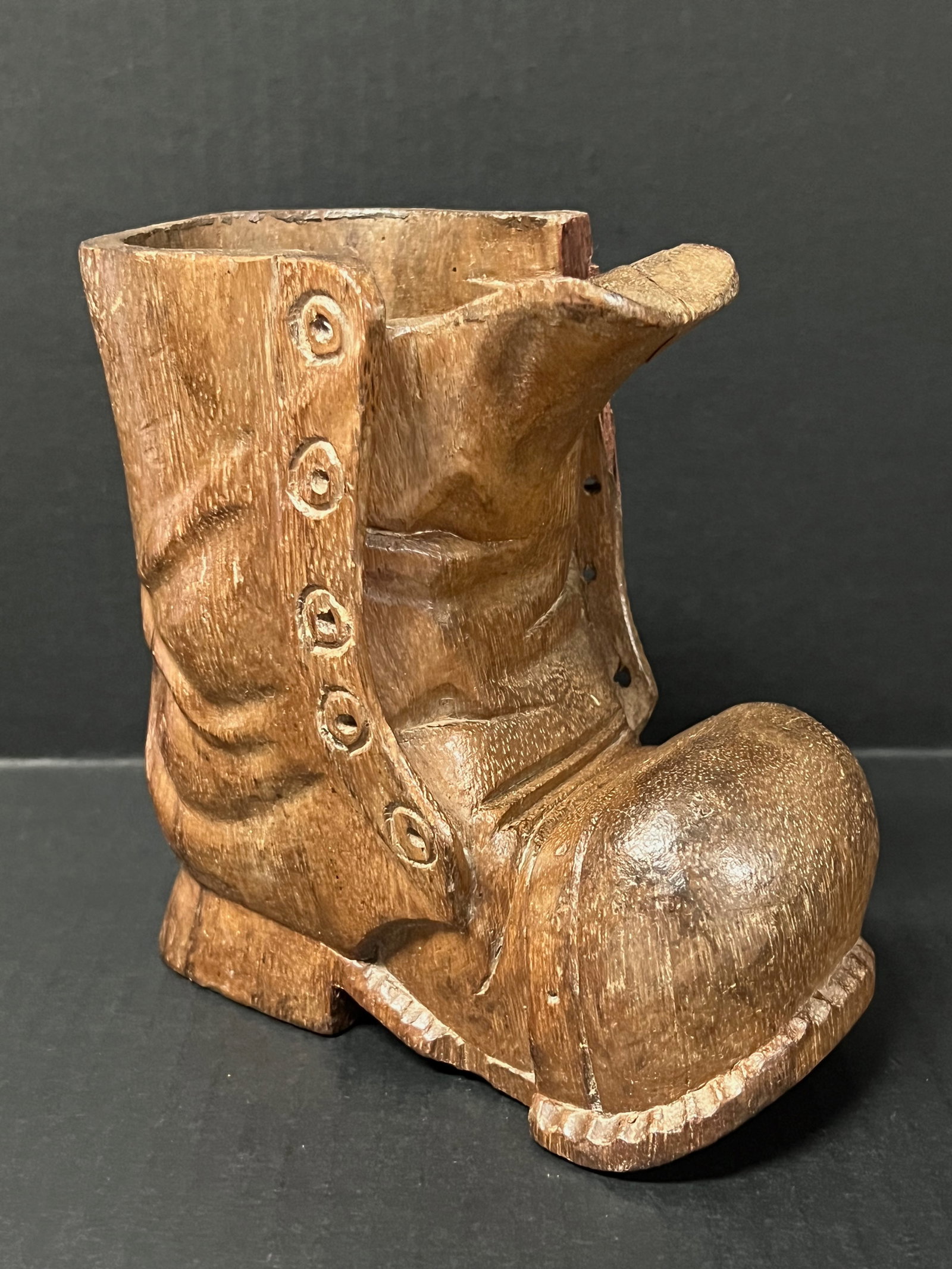 Carved Wood Santa Claus Boots Sculpture: Folk Art Carved Wood Santa Claus Boots Sculpture. The dimension is 6.25 inches high x 6 inches wide. Please be aware that some of the items are vintage, secondhand, old ages, antiques and may have a