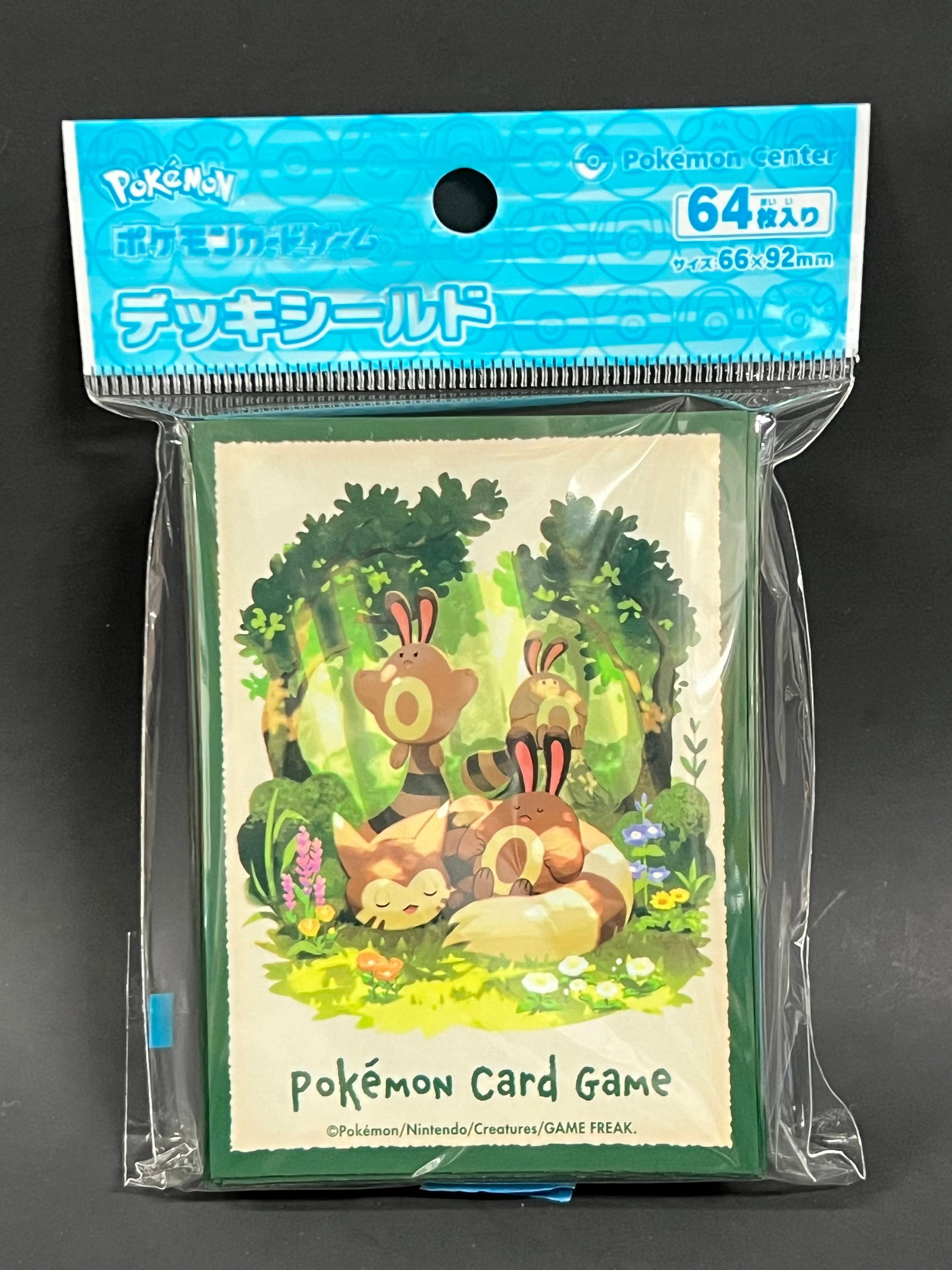 Pokemon Center Japan Exclusive Game Card Sleeves Pack of 64X: Pokemon Center Japan Excelusive Game Card Sleeves Pack of 64X. The dimension is 3.5 inches high x 2.25 inches wide. Please be aware that some of the items are vintage, secondhand, old ages, antiques