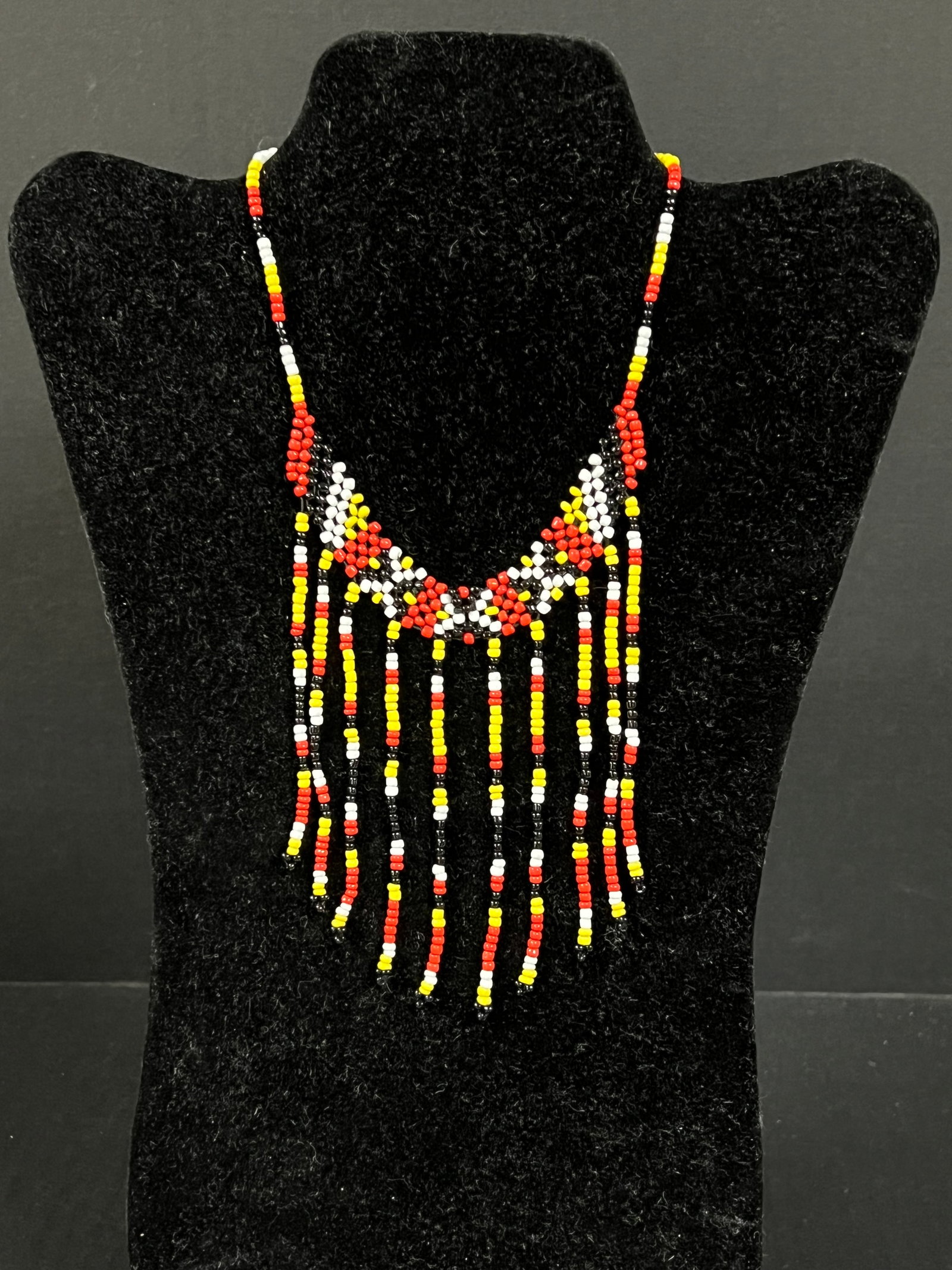 Philippine Tribal Art T'boli Ethnic Beaded Necklace: Philippine Tribal Art T'boli Ethnic Beaded Necklace. The dimension is 14.5 inches round. Please be aware that some of the items are vintage, secondhand, old ages, antiques and may have a defects or