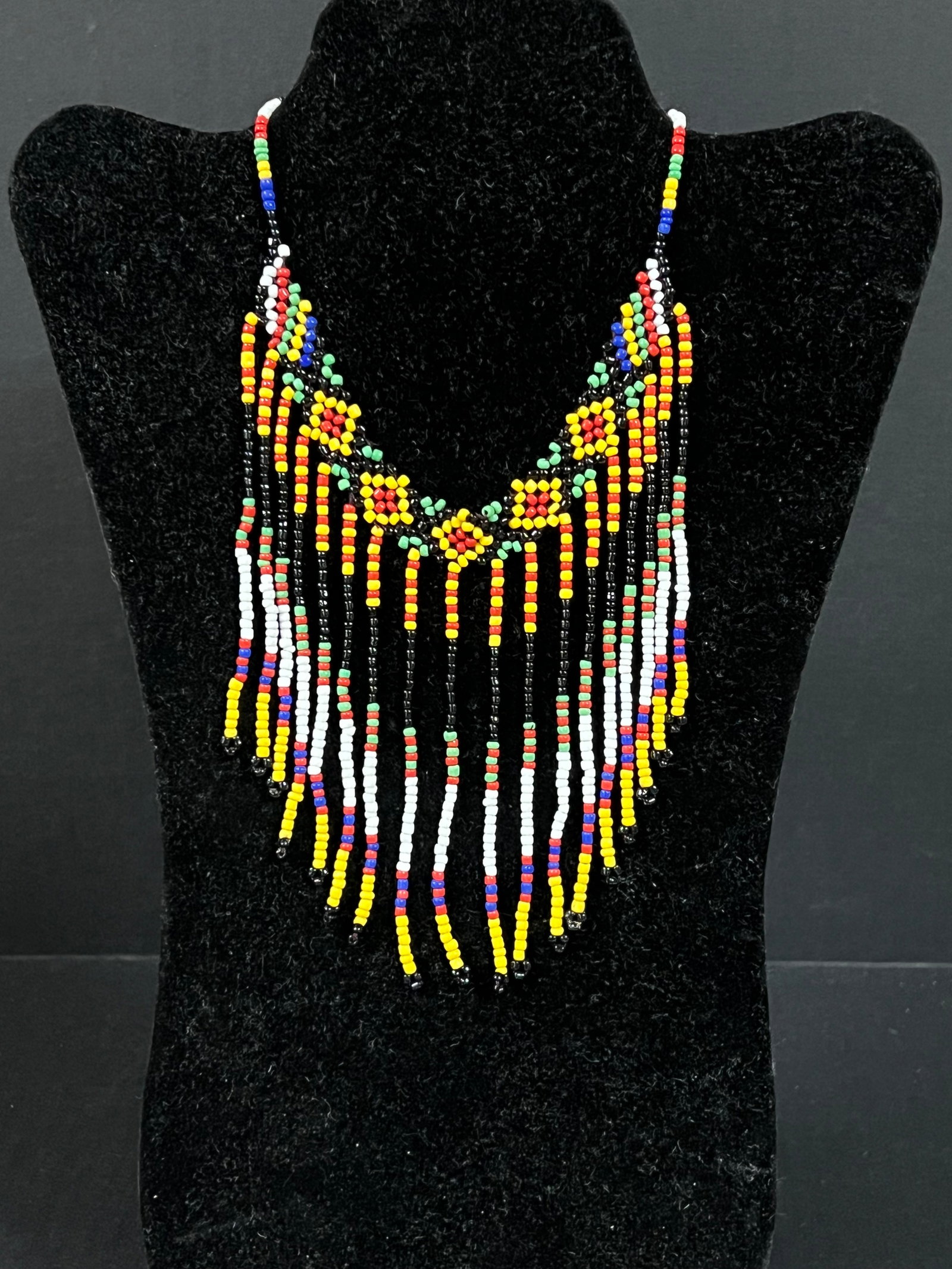 Philippine Tribal Art T'boli Ethnic Beaded Necklace: Philippine Tribal Art T'boli Ethnic Beaded Necklace. The dimension is 14.5 inches round. Please be aware that some of the items are vintage, secondhand, old ages, antiques and may have a defects or