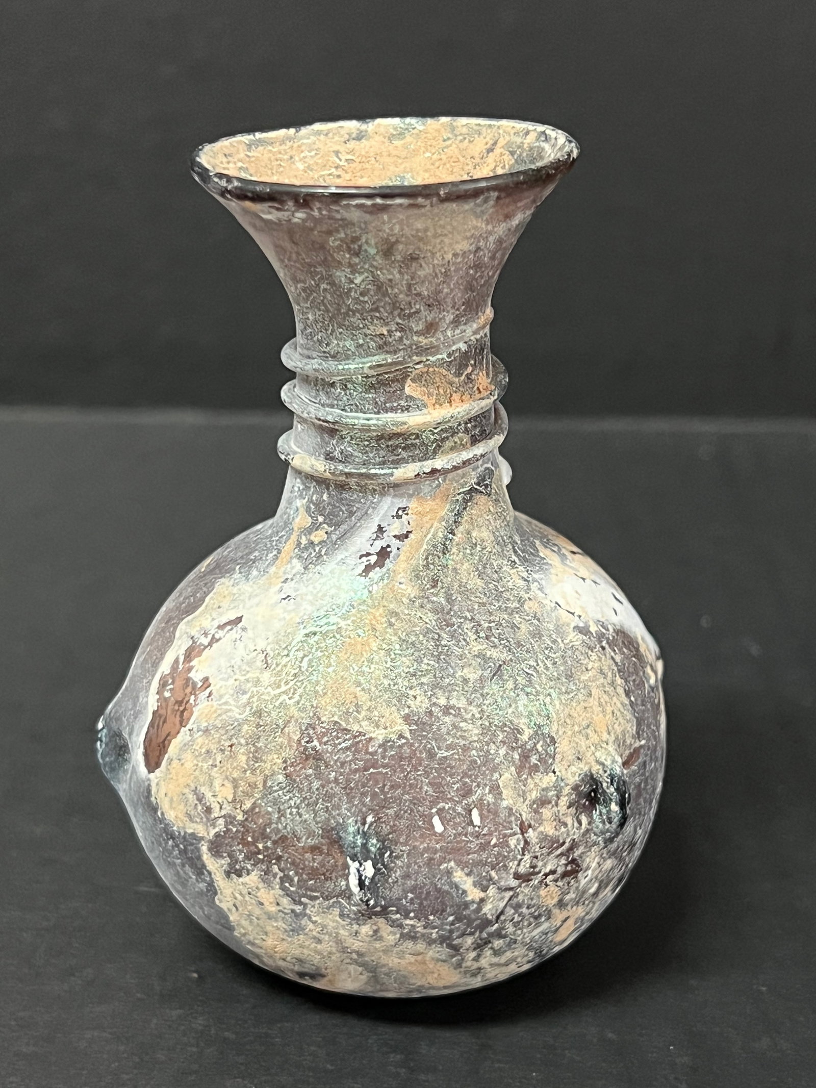 Roman Art Style Glass Bottle: Roman Art Style Glass Bottle. The dimension is 4.25 inches high x 2.5 inches wide. Please be aware that some of the items are vintage, secondhand, old ages, antiques and may have a defects or sign of