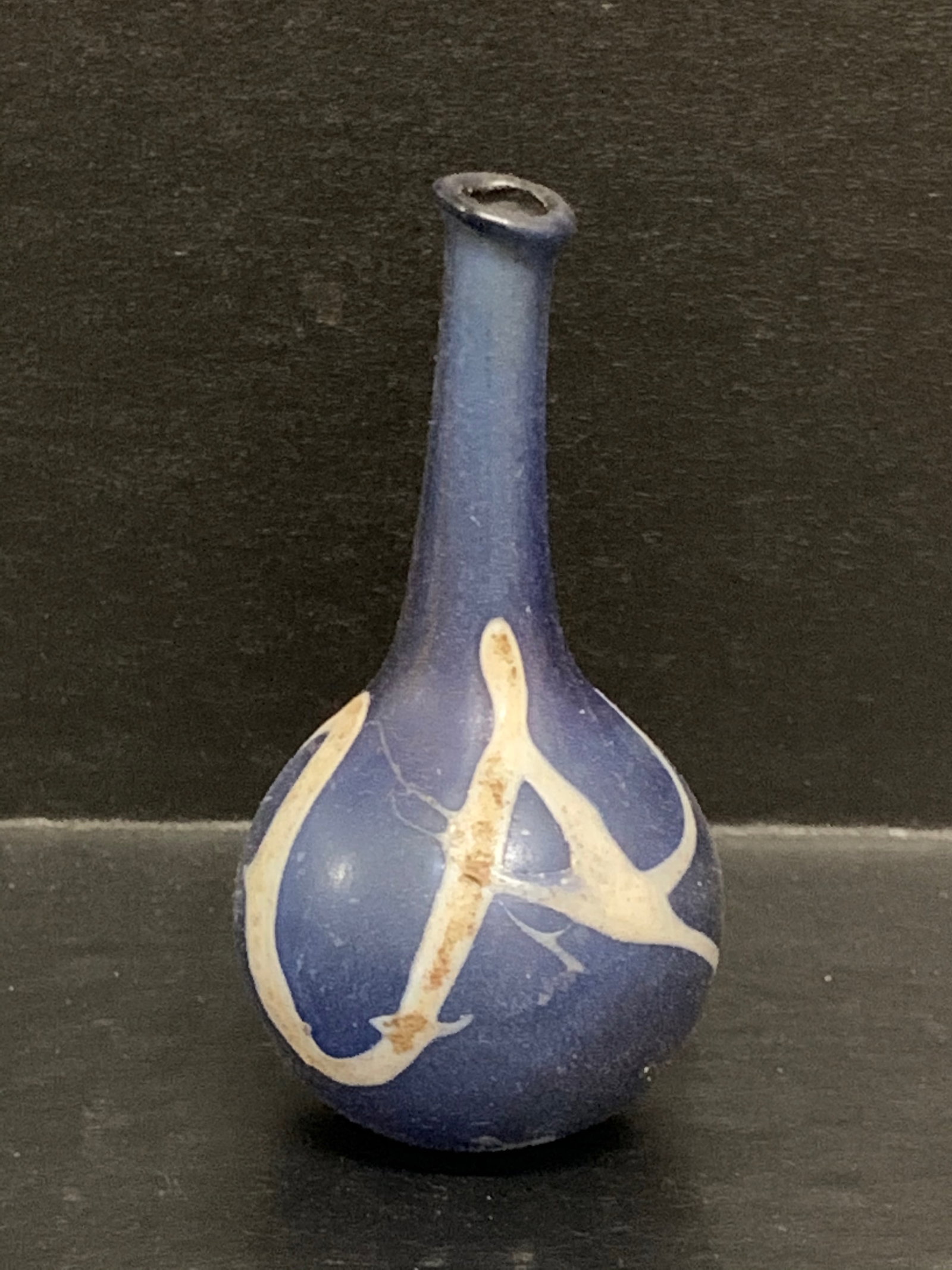 Roman Art Style Glass Bottle: Roman Art Style Glass Bottle. The dimension is 3 inches high x 2.5 inches wide. Please be aware that some of the items are vintage, secondhand, old ages, antiques and may have a defects or sign of