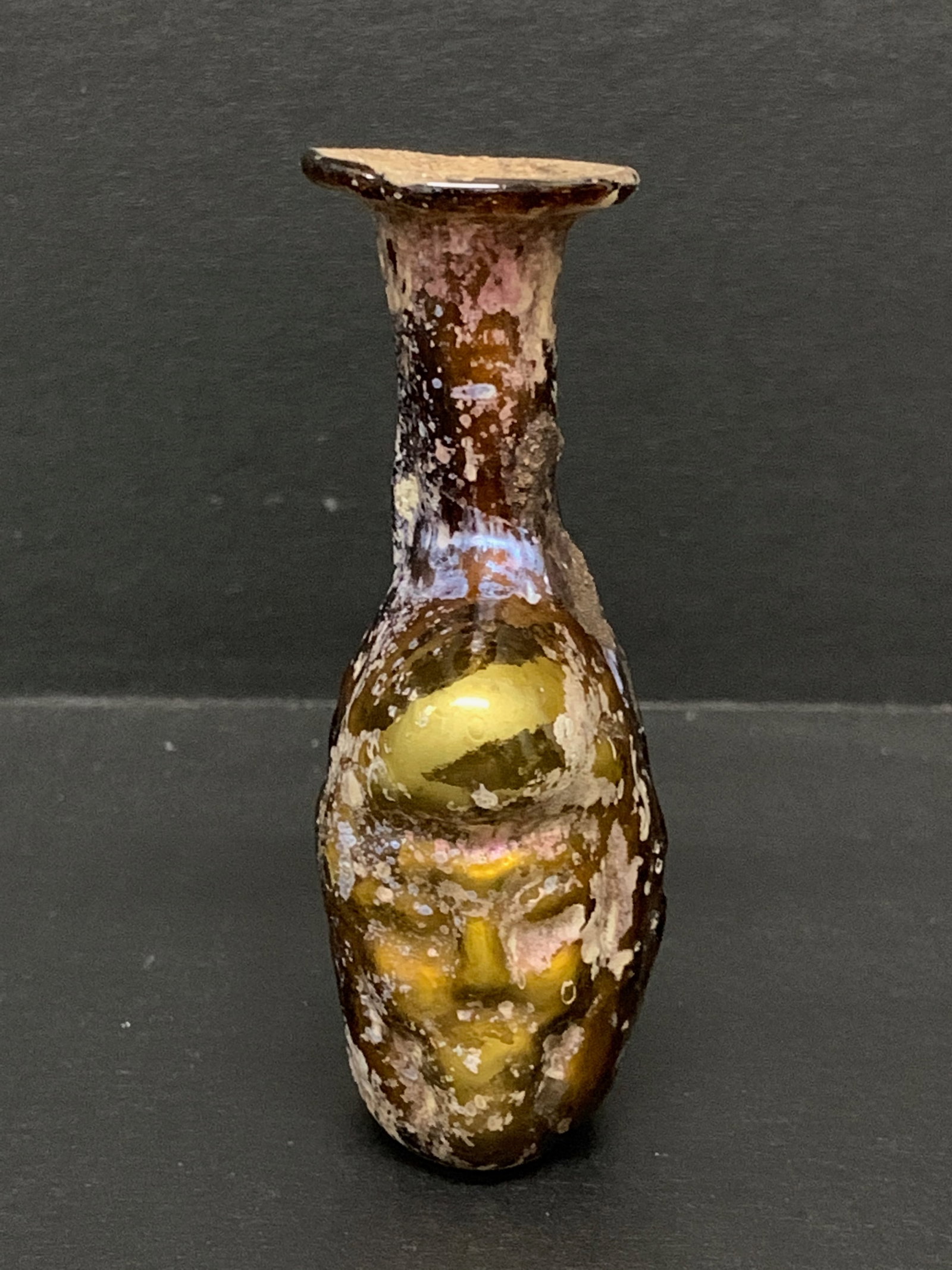 Roman Art Style Glass Bottle: Roman Art Style Glass Bottle. The dimension is 4 inches high x 2 inches wide. Please be aware that some of the items are vintage, secondhand, old ages, antiques and may have a defects or sign of