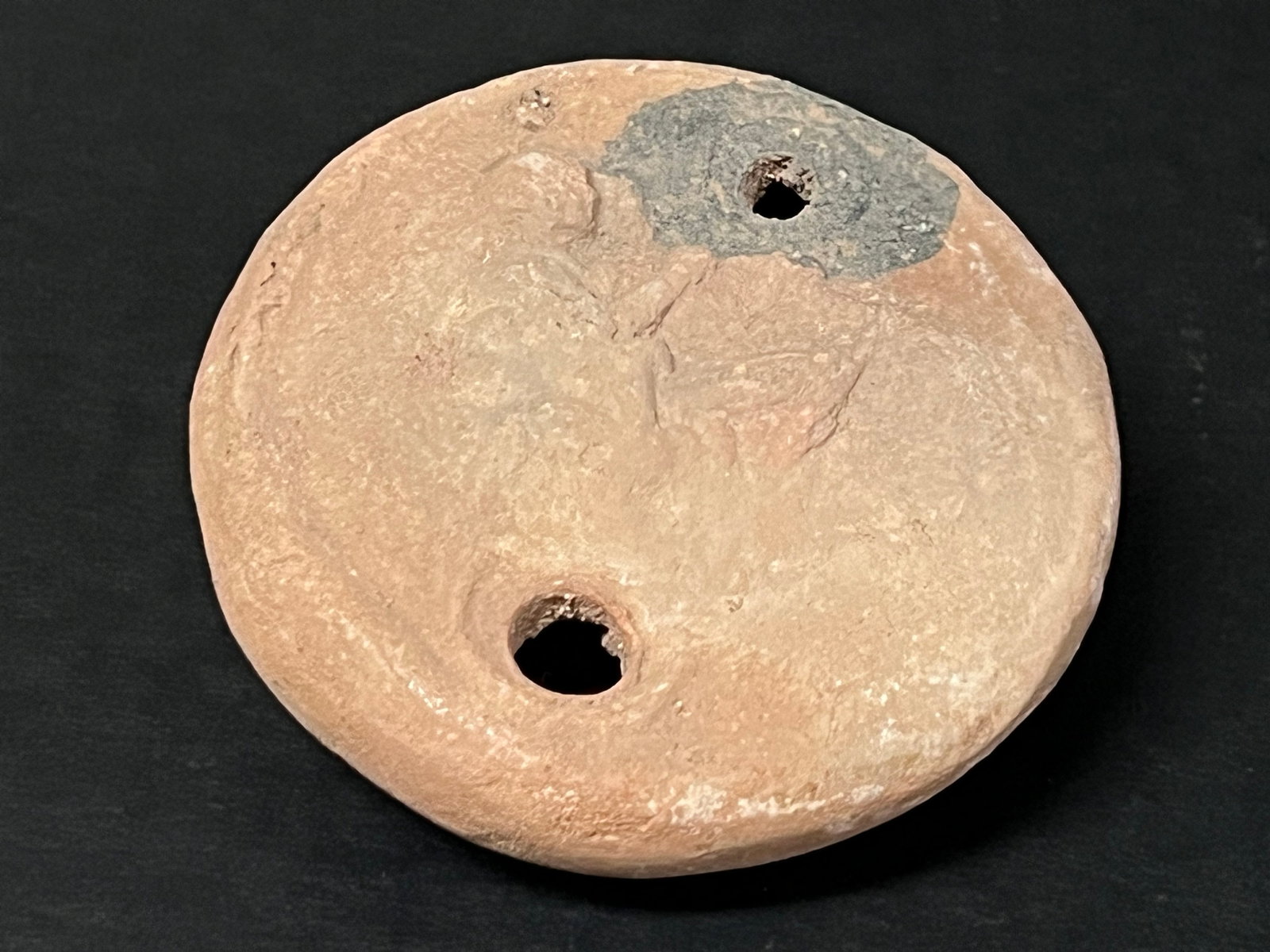 Vintage Terra Cotta Oil Lamp: Vintage Terra Cotta Oil Lamp. The dimension is 1 inches high x 2 inches wide. Please be aware that some of the items are vintage, secondhand, old ages, antiques and may have a defects or sign of ages,