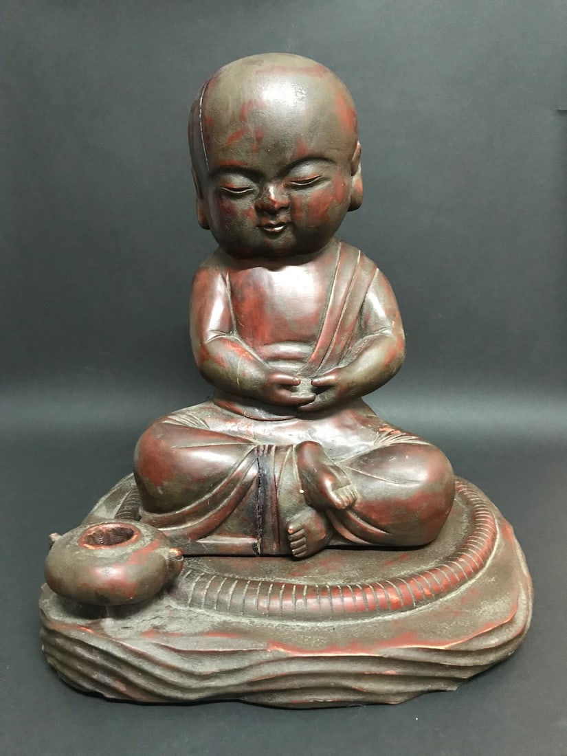 Chinese Art Carved Wood Baby Buddha Sculpture: Chinese Art Carved Wood Baby Buddha Sculpture. The dimension is 12 inches high x 10 inches wide x 6 inches depth. Please be aware that some of the items are vintage, secondhand, old ages, antiques