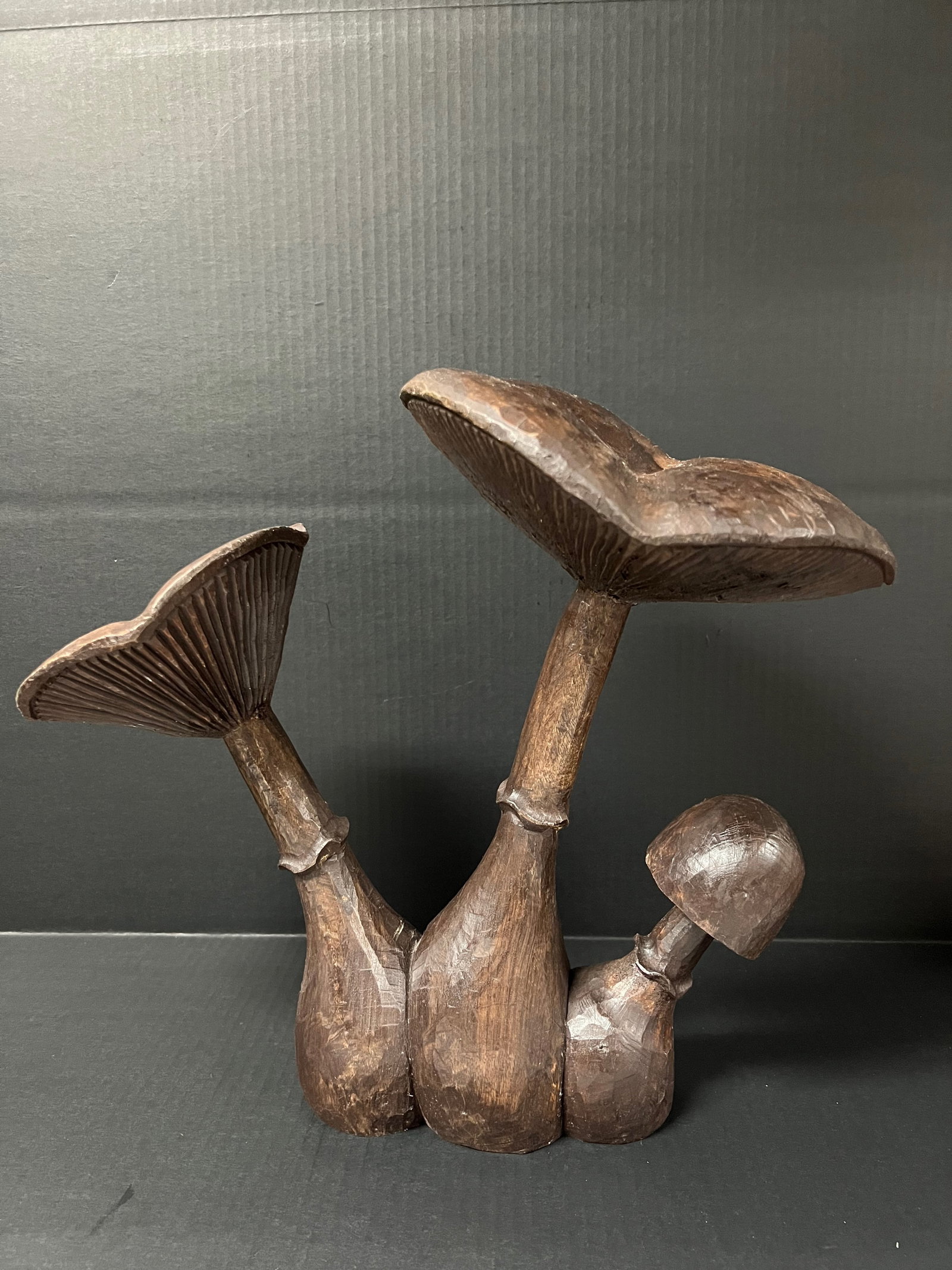 Carved Wood Mushroom Sculpture: Folk Art Carved Wood Mushroom Sculpture. The dimension is 15 inches high x 16 inches wide. Please be aware that some of the items are vintage, secondhand, old ages, antiques and may have a defects or