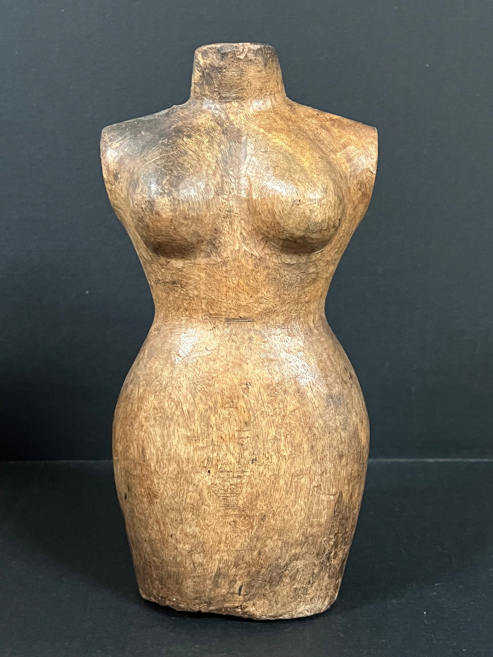 Carved Wood Mannequin - Torso: Folk Art Carved Wood Mannequin - Torso. The dimension is 10 inches high x 5 inches depth x 3.5 inches wide. Please be aware that some of the items are vintage, secondhand, old ages, antiques and may