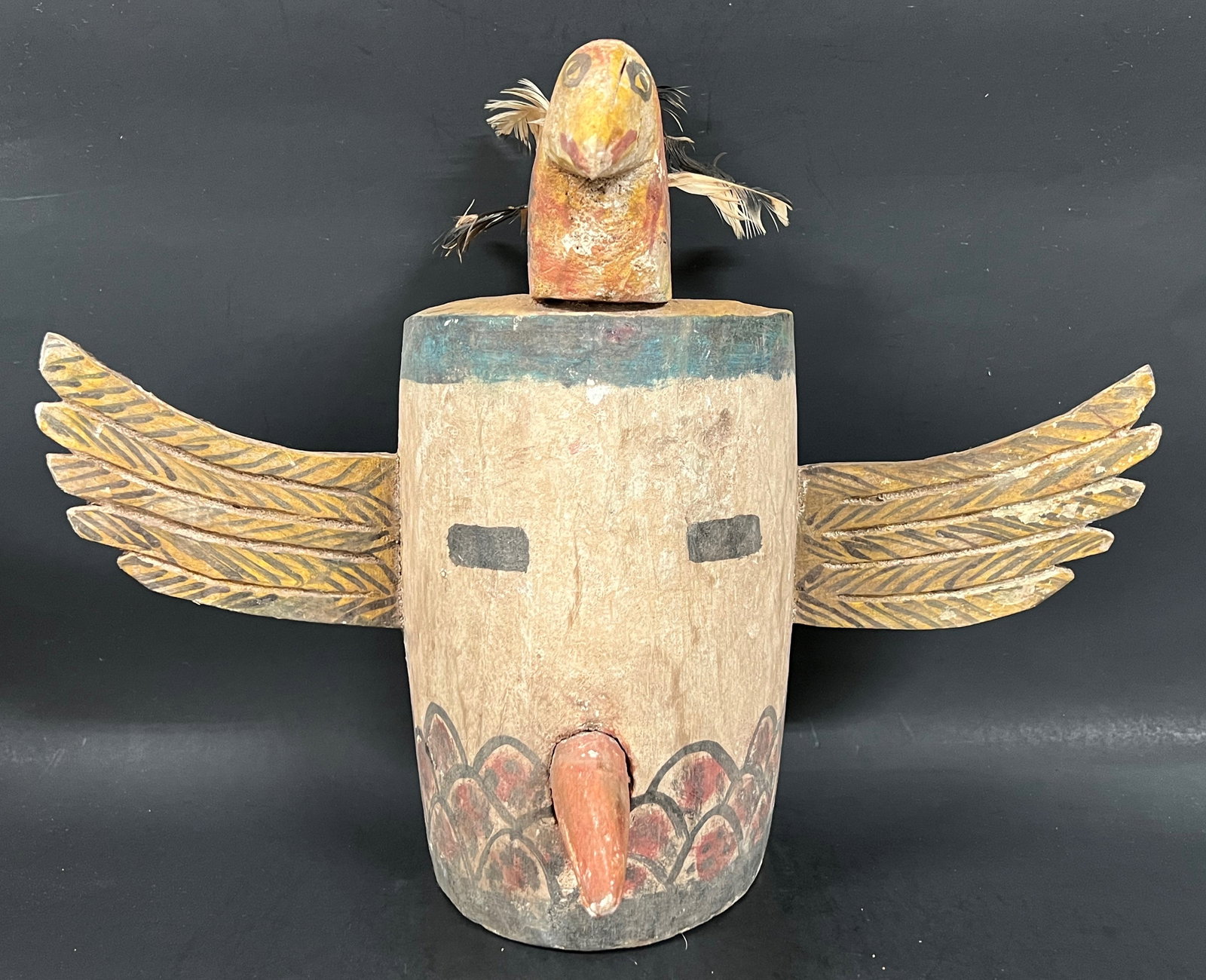 Kachina Painted Carved Wood Mask: Kachina Painted Carved Wood Mask. The dimension is 12 inches high x 16.5 inches wide. Please be aware that some of the items are vintage, secondhand, old ages, antiques and may have a defects or sign