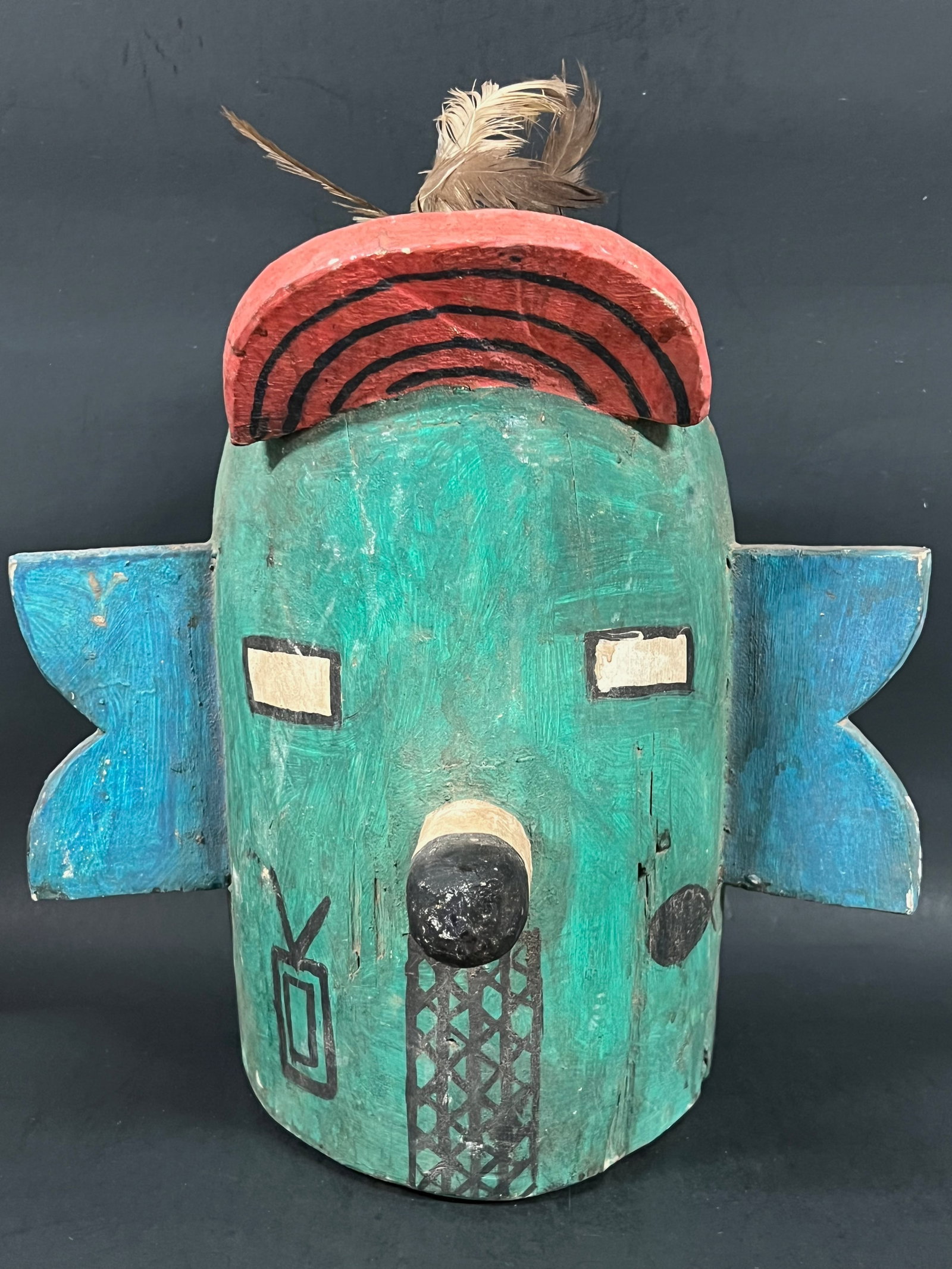 Kachina Painted Carved Wood Mask: Kachina Painted Carved Wood Mask. The dimension is 11 inches high x 11 inches wide. Please be aware that some of the items are vintage, secondhand, old ages, antiques and may have a defects or sign of