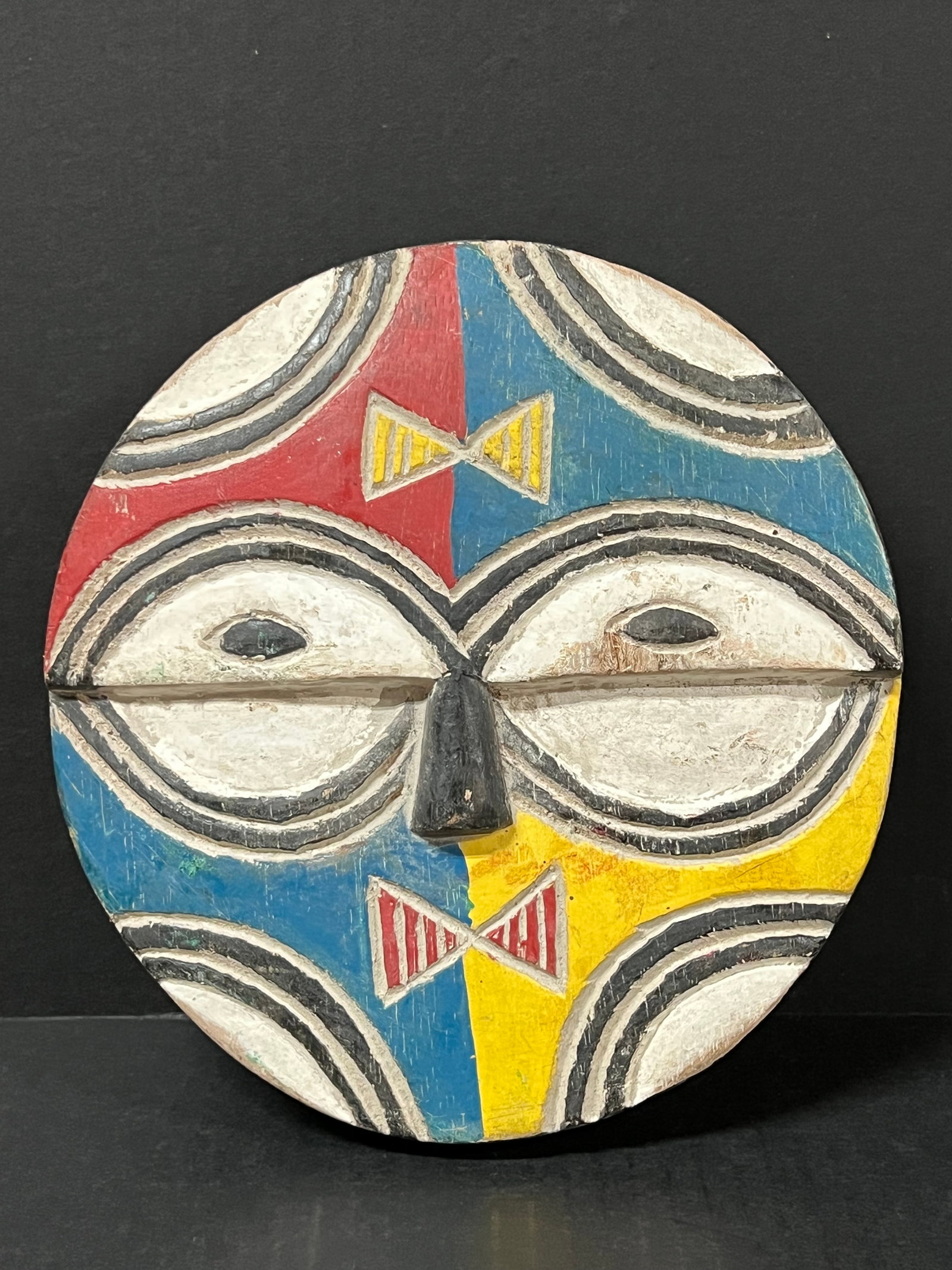 Teke Mask: African Tribal Art Teke Mask. The dimension is 8.5 inches high x 1 inches depth x 8 inches wide. Please be aware that some of the items are vintage, secondhand, old ages, antiques and may have a