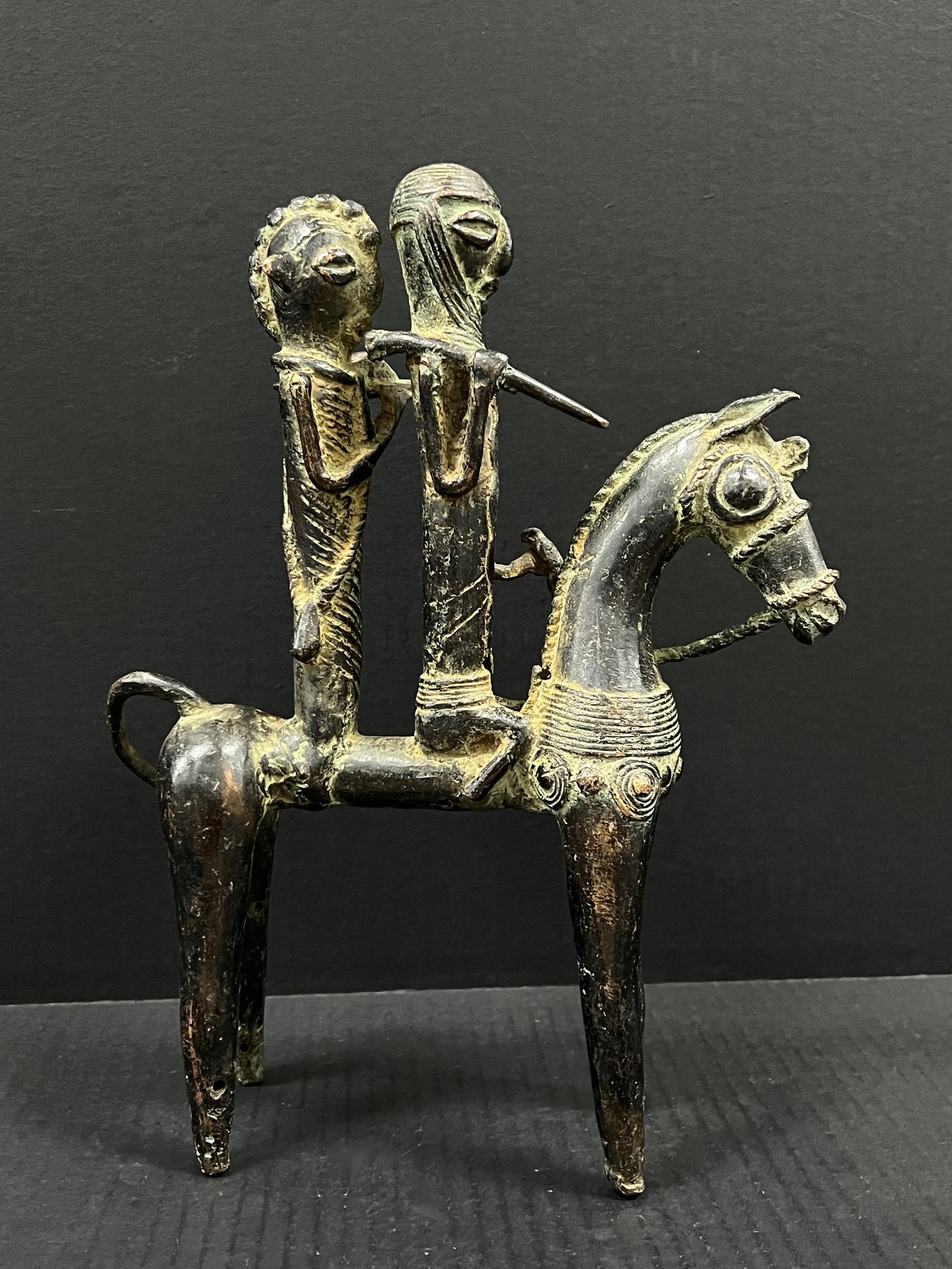 Bronze Chad Horse with Rider Sculpture: African Tribal Art Bronze Chad Horse with Rider Sculpture. The dimension is 12.5 inches high x 9.5 inches wide. Please be aware that some of the items are vintage, secondhand, old ages, antiques and m