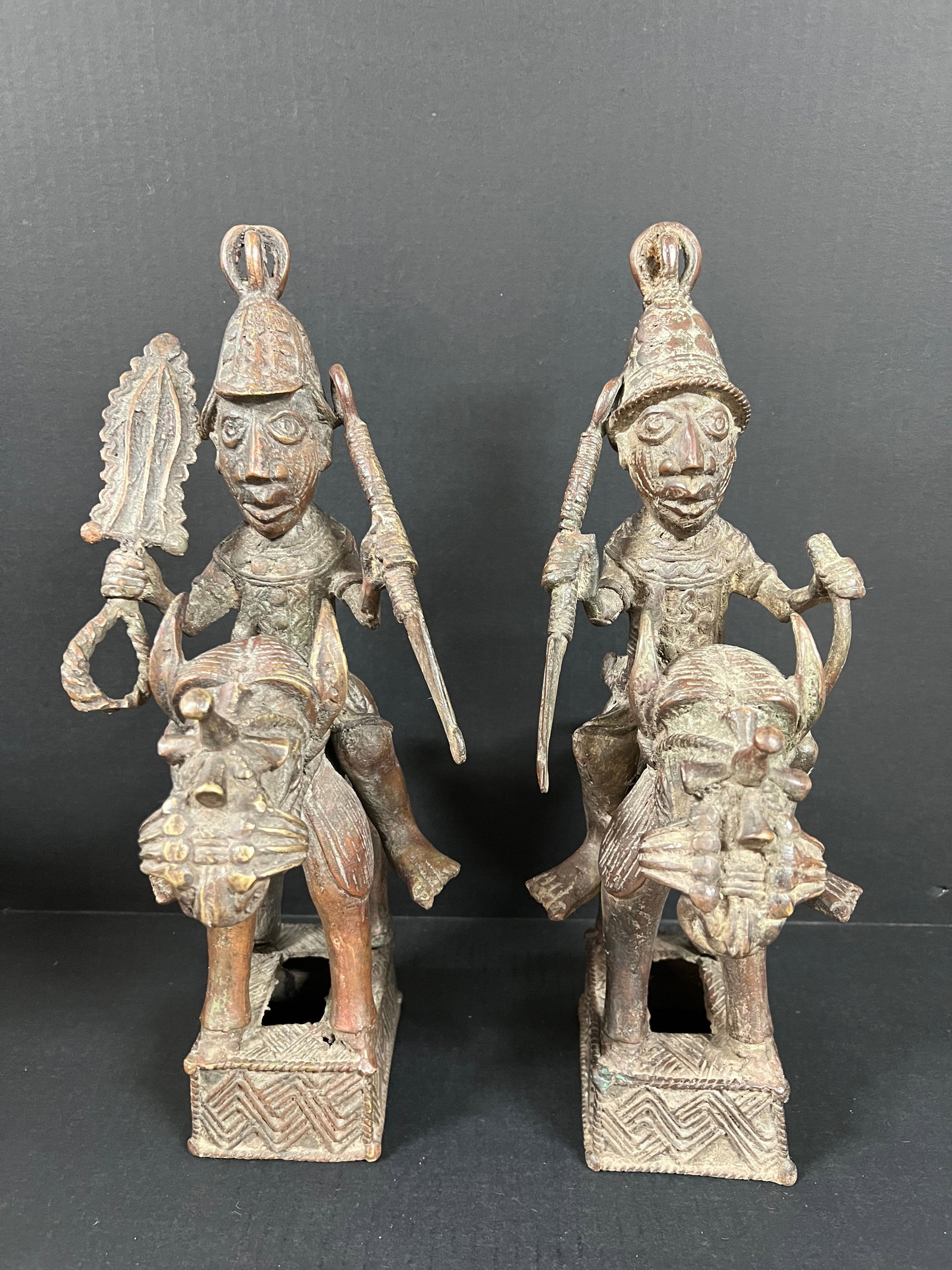 Pair of Benin Bronze Horse with Rider Warrior Statue: African Tribal Art Pair of Benin Bronze Horse with Rider Warrior Statue. The dimension is 15 inches high x 9 inches wide. Please be aware that some of the items are vintage, secondhand, old ages,