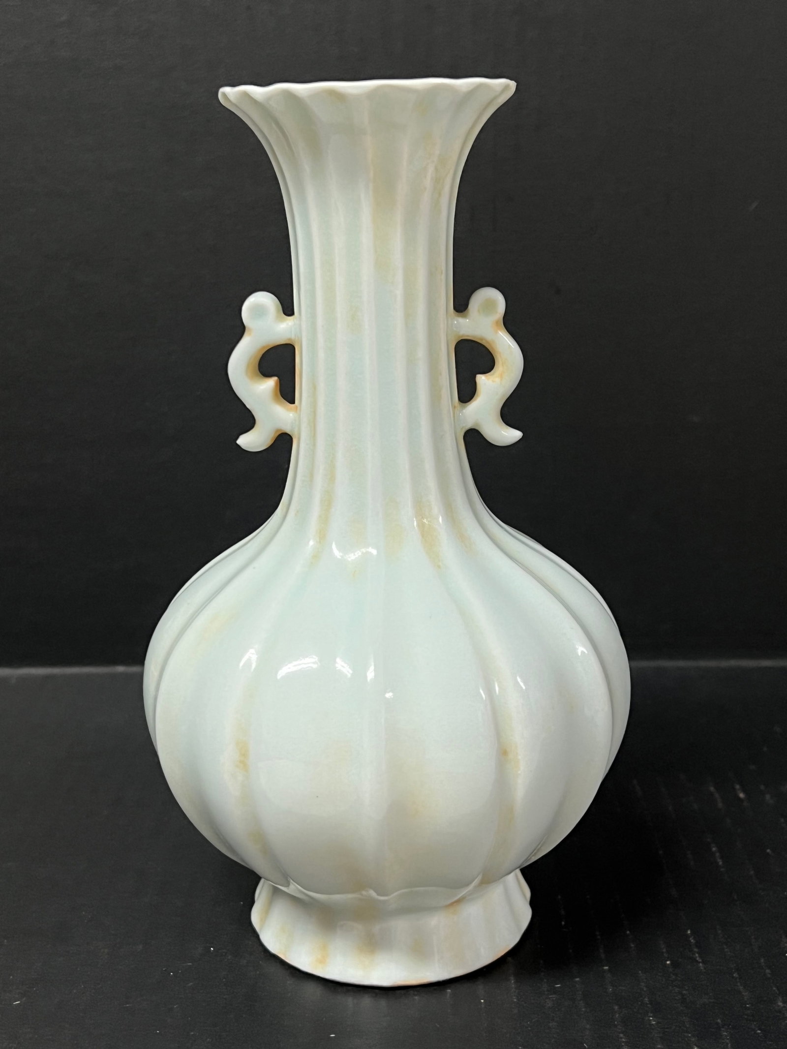 Porcelain Celadon Qing Bai Vase: Chinese Art Porcelain Celadon Qing Bai Vase. The dimension is 8.5 inches high x 5 inches wide. Please be aware that some of the items are vintage, secondhand, old ages, antiques and may have a defects