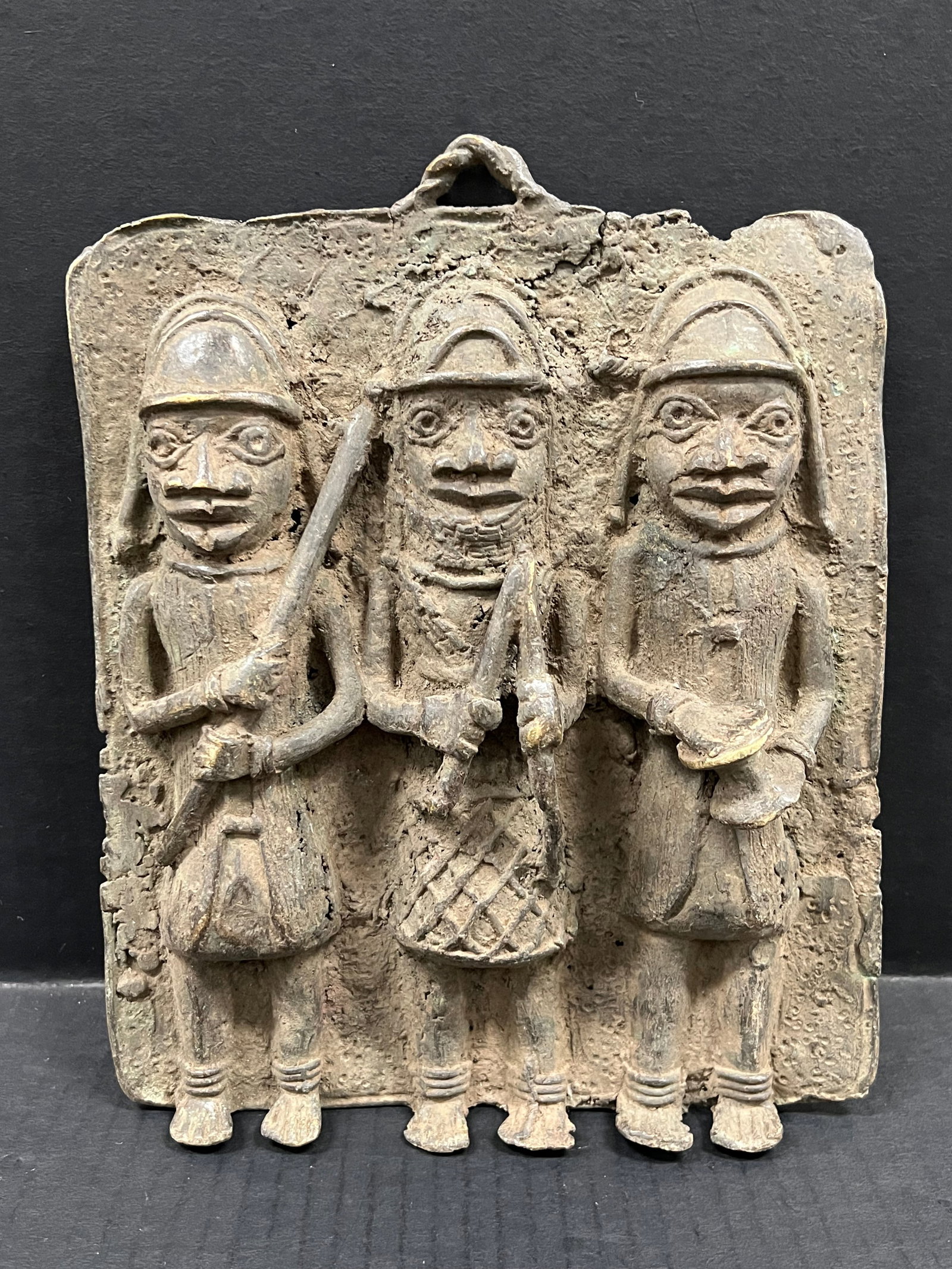 Benin Bronze Plaque Sculpture: African Tribal Art Benin Bronze Plaque Sculpture. The dimension is 10.5 inches high x 8.5 inches wide. Please be aware that some of the items are vintage, secondhand, old ages, antiques and may have a