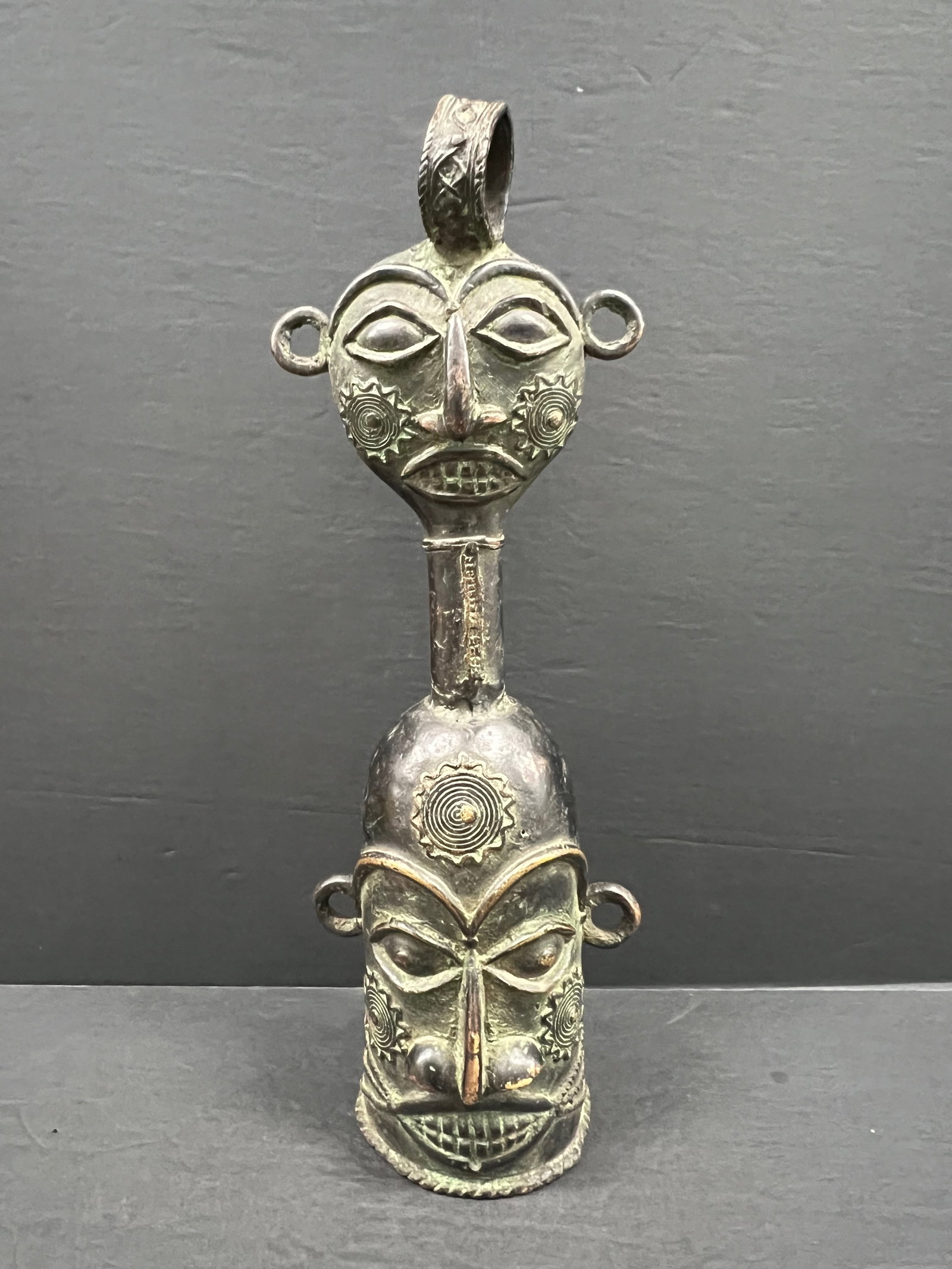 Benin Bronze Bell Sculpture: African Tribal Art Benin Bronze Bell Sculpture. The dimension is 18 inches high x 6.75 inches wide. Please be aware that some of the items are vintage, secondhand, old ages, antiques and may have a de