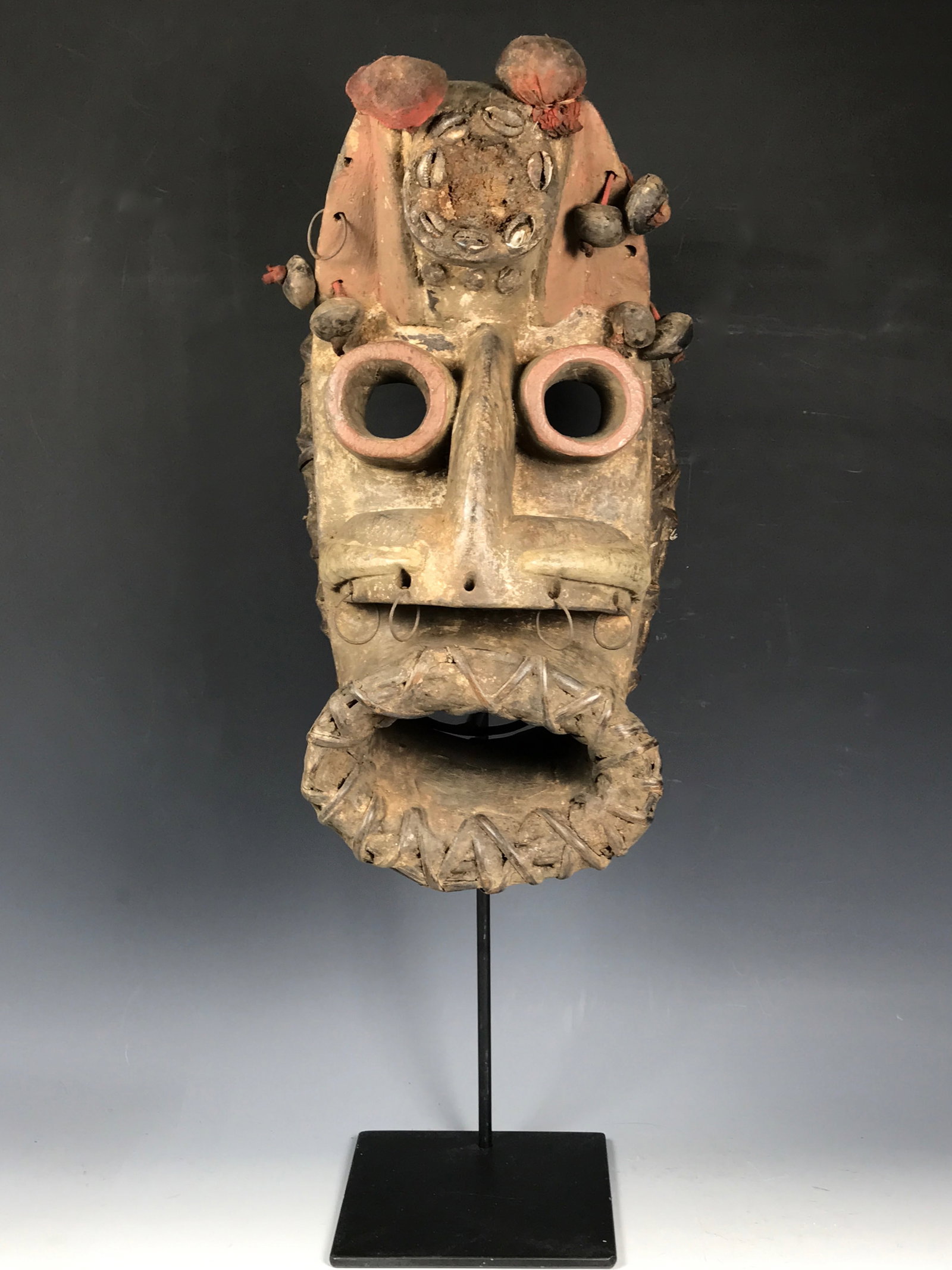 Large Carved Wood Dan Grebo Mask with Display Stand: African Tribal Art Large Carved Wood Dan Grebo Mask with Display Stand. The dimension is 24 inches high x 7.5 inches wide. Please be aware that some of the items are vintage, secondhand, old ages,