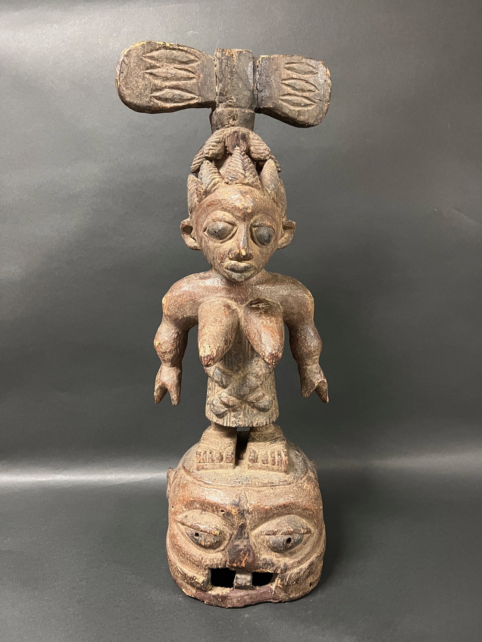 Carved Wood Yuroba Shango Statue: African Tribal Art Carved Wood Yuroba Shango Statue. The dimension is 23.5 inches high x 8.5 inches wide. Please be aware that some of the items are vintage, secondhand, old ages, antiques and may