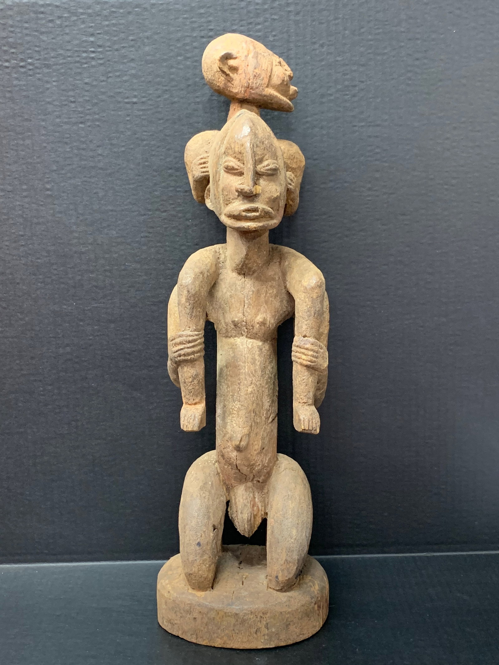 Carved Wood Dogon Statue: African Tribal Art Carved Wood Dogon Statue. The dimension is 21 inches high x 6.5 inches wide. Please be aware that some of the items are vintage, secondhand, old ages, antiques and may have a defect