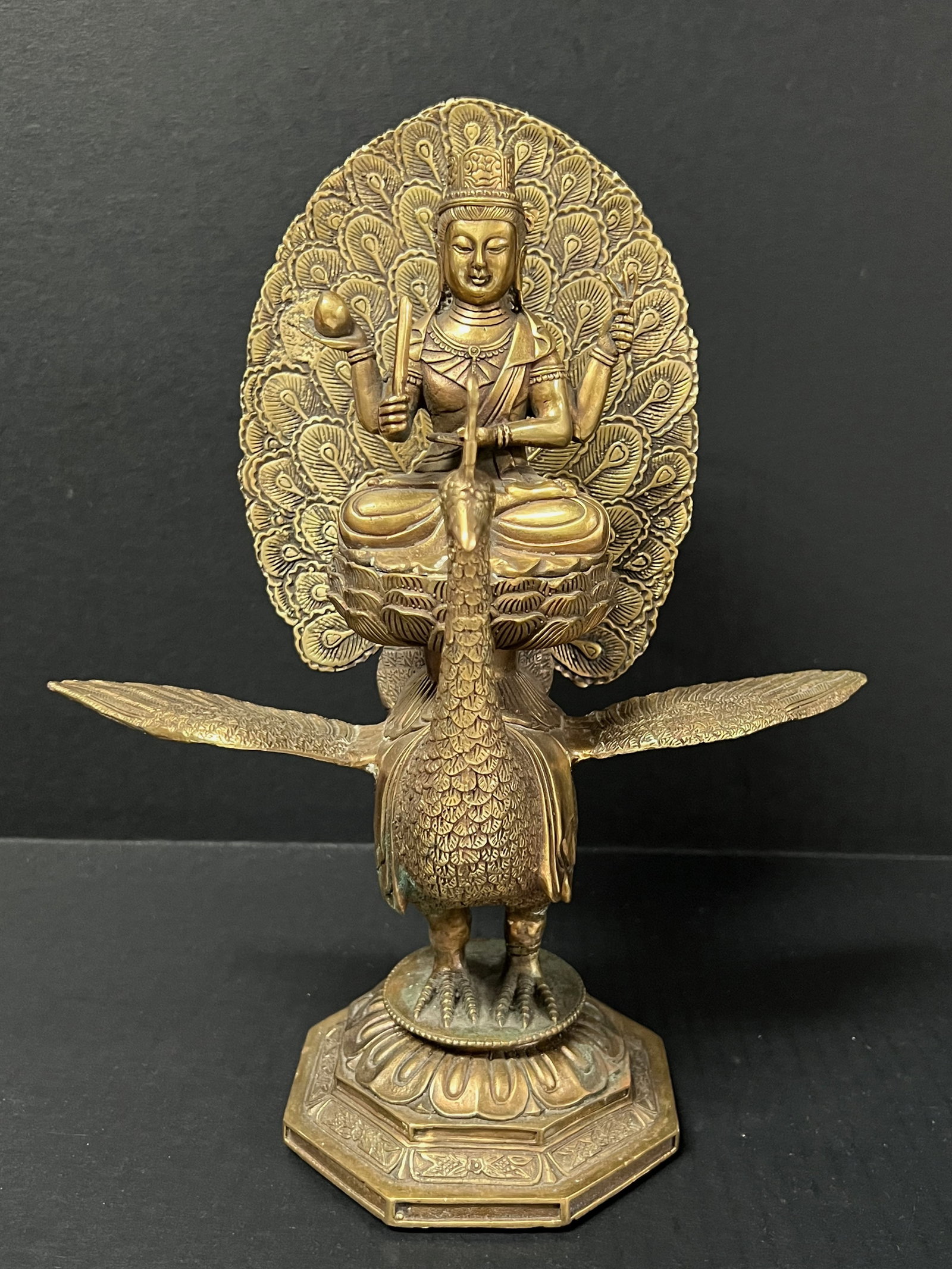 A Bronze Gold Gilt Buddhist Deity Riding A Peacock Sculpture (1 of 10)