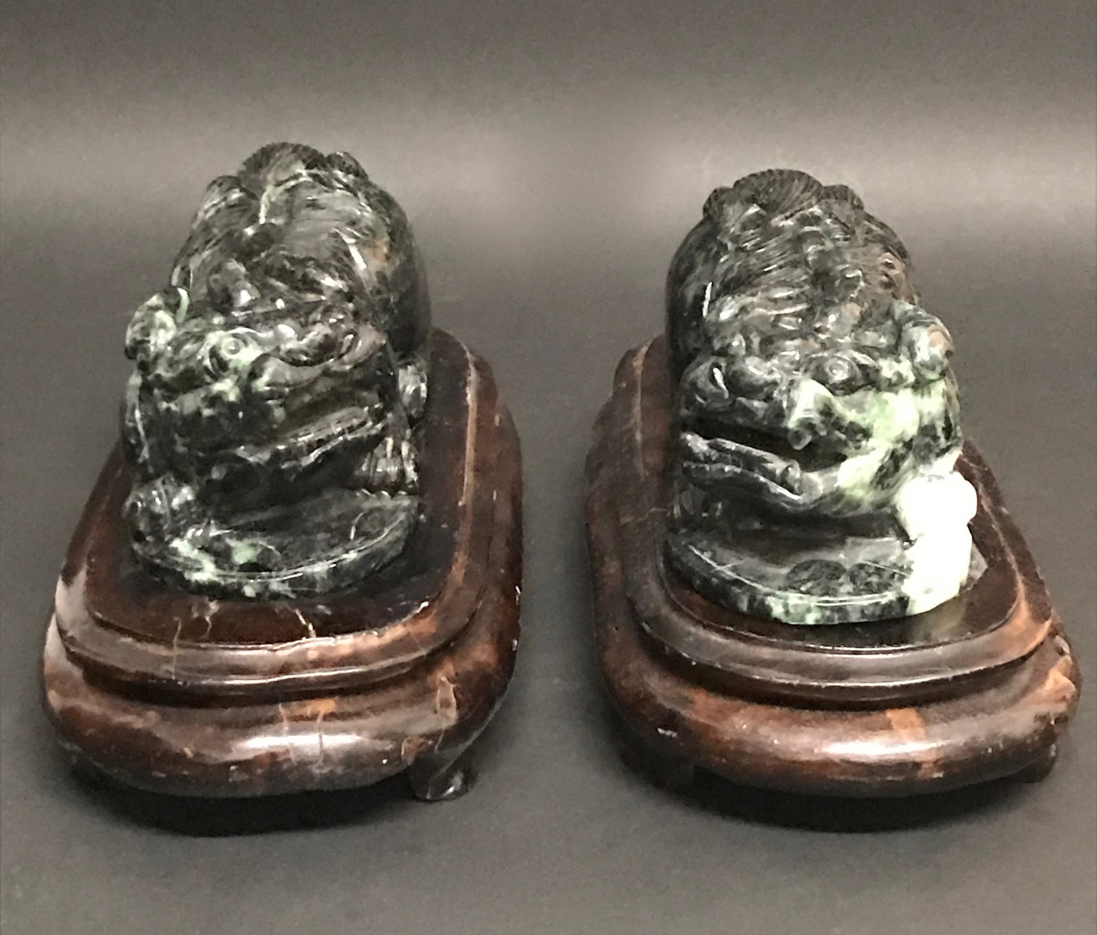 Pair of Dark Green Burmese Solid Jade Pixue Animal Sculpture: Chinese Art Pair of Dark Green Burmese Solid Jade Pixue Animal Sculpture with Wood Base. The dimension is 3 inches high x 6 inches wide. Please be aware that some of the items are vintage, secondhand,