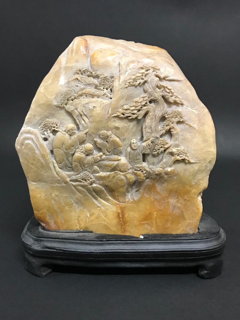 A Carved Shoushan Stone Mountain Villages Scenery: Chinese Art Carved Shoushan Stone Mountain Villages Scenery with Wood Base.The dimension is 7 inches high x 5.5 inches wide. Please be aware that some of the items are vintage, secondhand, old ages, a
