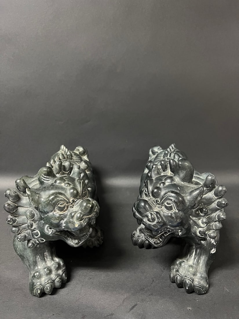 Pair of Carved Dark Green Soapstone Pi Xue Sculpture: Pair of Carved Dark Green Soapstone Pi Xue Sculpture. The dimension is 7 inches high x 14.5 inches wide. Please be aware that some of the items are vintage, secondhand, old ages, antiques and may have