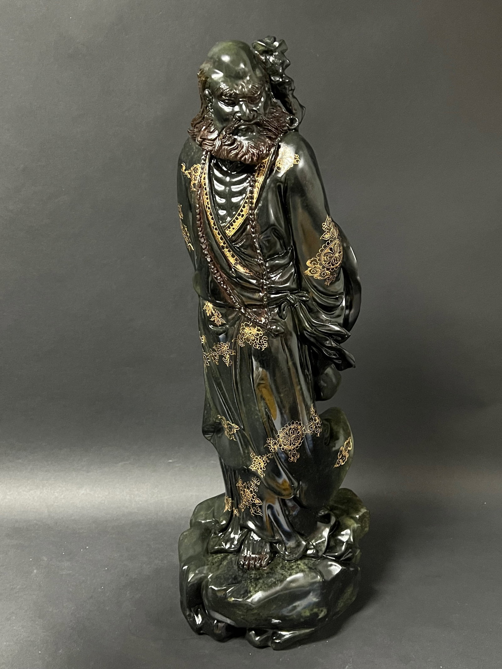 Carved Dark Green Shoushan Stone Longevity Sculpture with Gold Accent: Chinese Art Carved Dark Shoushan Stone Longevity Sculpture with Gold Accent. The dimension is 21.75 inches high x 9 inches wide. Please be aware that some of the items are vintage, secondhand, old age
