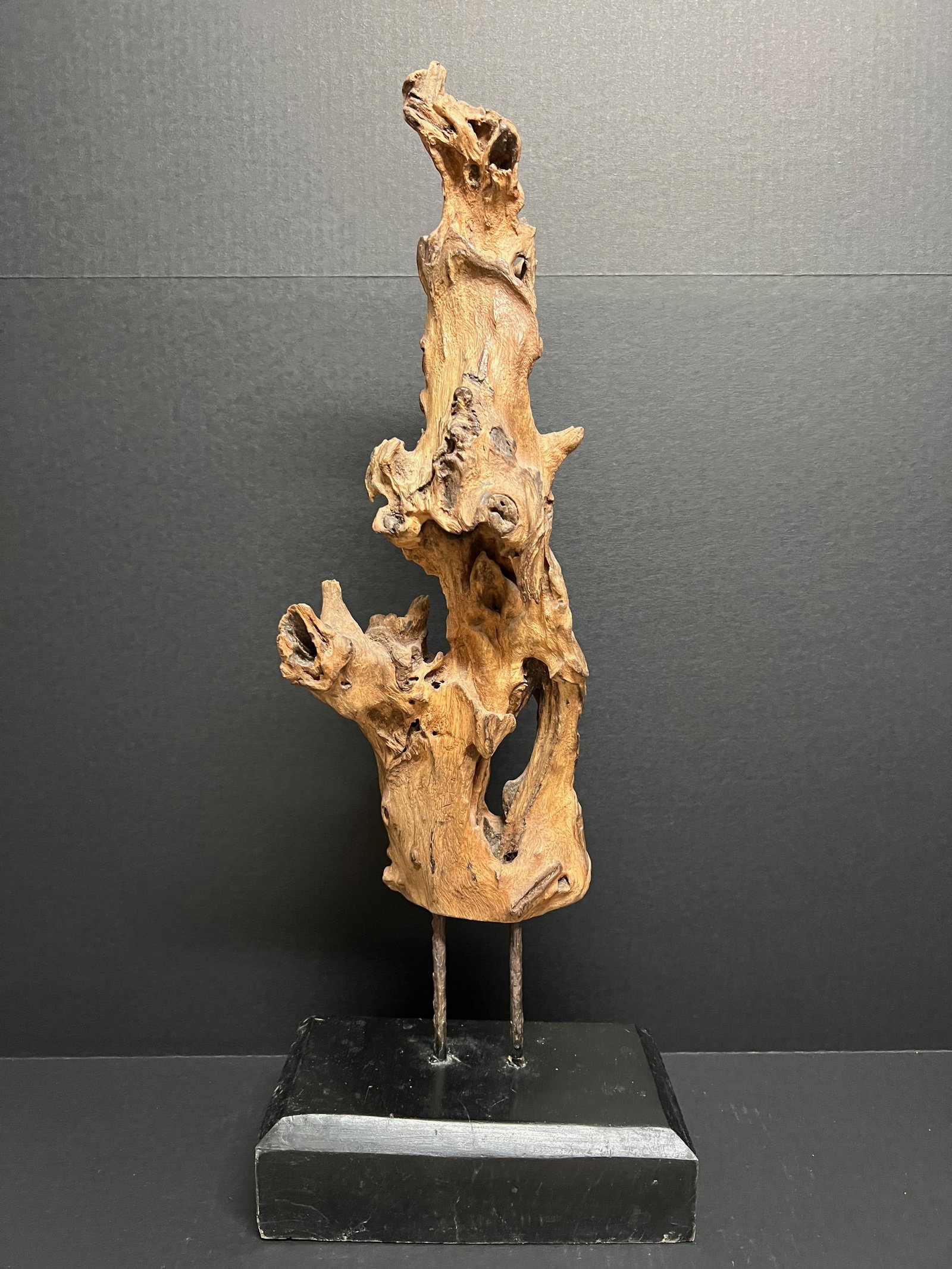 Chinese Carved Abstract Driftwood Sculpture on Display Stand: Chinese Art Carved Abstract Driftwood With Wooden Display Stand . The dimension is 27 inches high x 10.5 inches wide. Please be aware that some of the items are vintage, secondhand, old ages, antiques