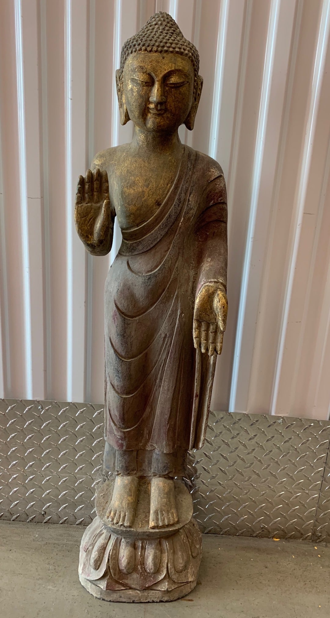 Chinese Art Carved Stone Standing Buddha Statue with Lotus Base: Chinese Art Carved Stone Standing Buddha with Lotus Base. The dimension is 40 inches high x 10 inches wide. Please be aware that some of the items are vintage, secondhand, old ages, antiques and may h