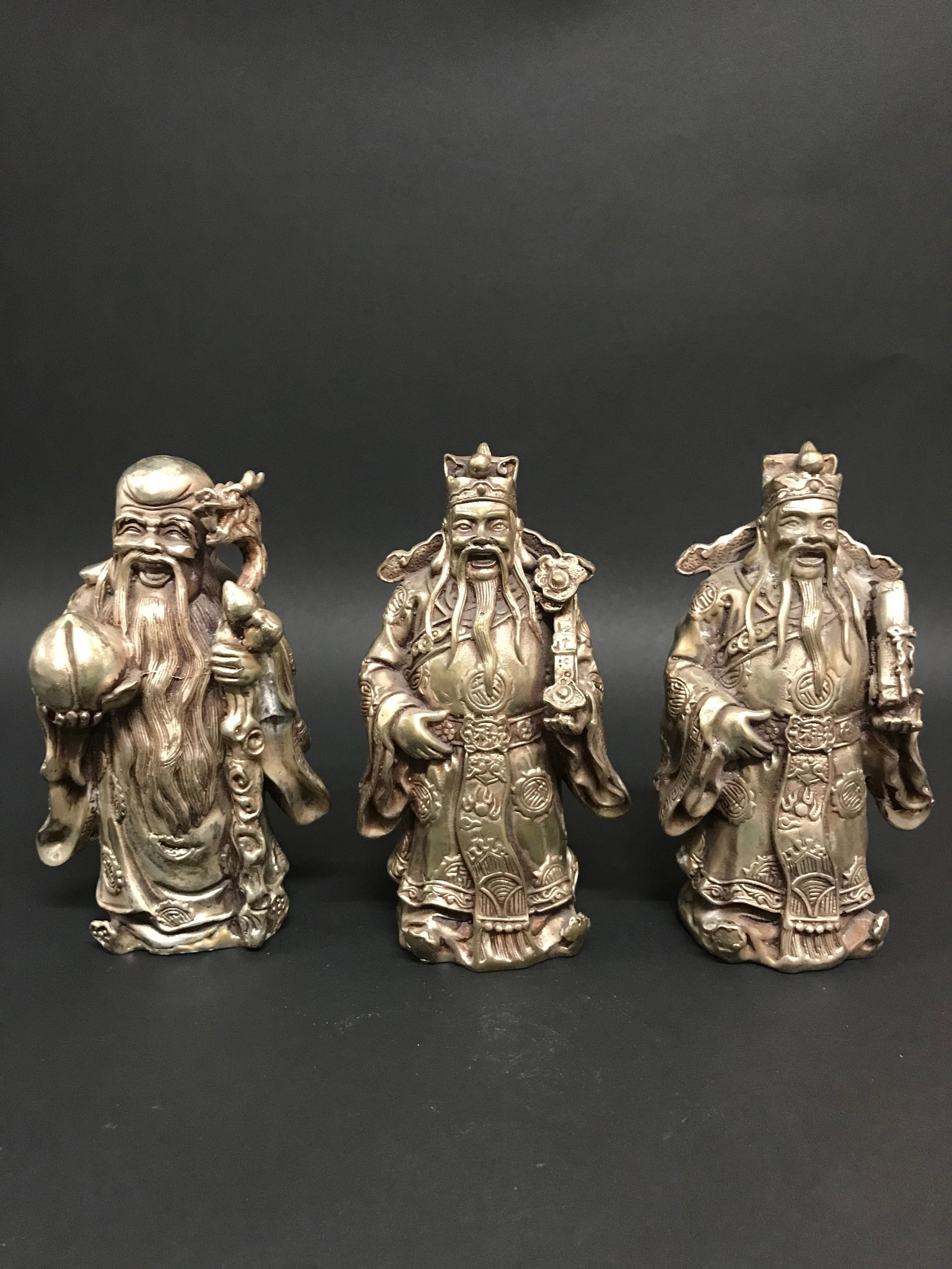 Set of 3 Silver Gilt Metal Immortals God Statue: Chinese Art Set of 3 Silver Gilt Metal Immortals God Statue. The dimension is 6 inches high x 3.75 inches wide. Please be aware that some of the items are vintage, secondhand, old ages, antiques and m