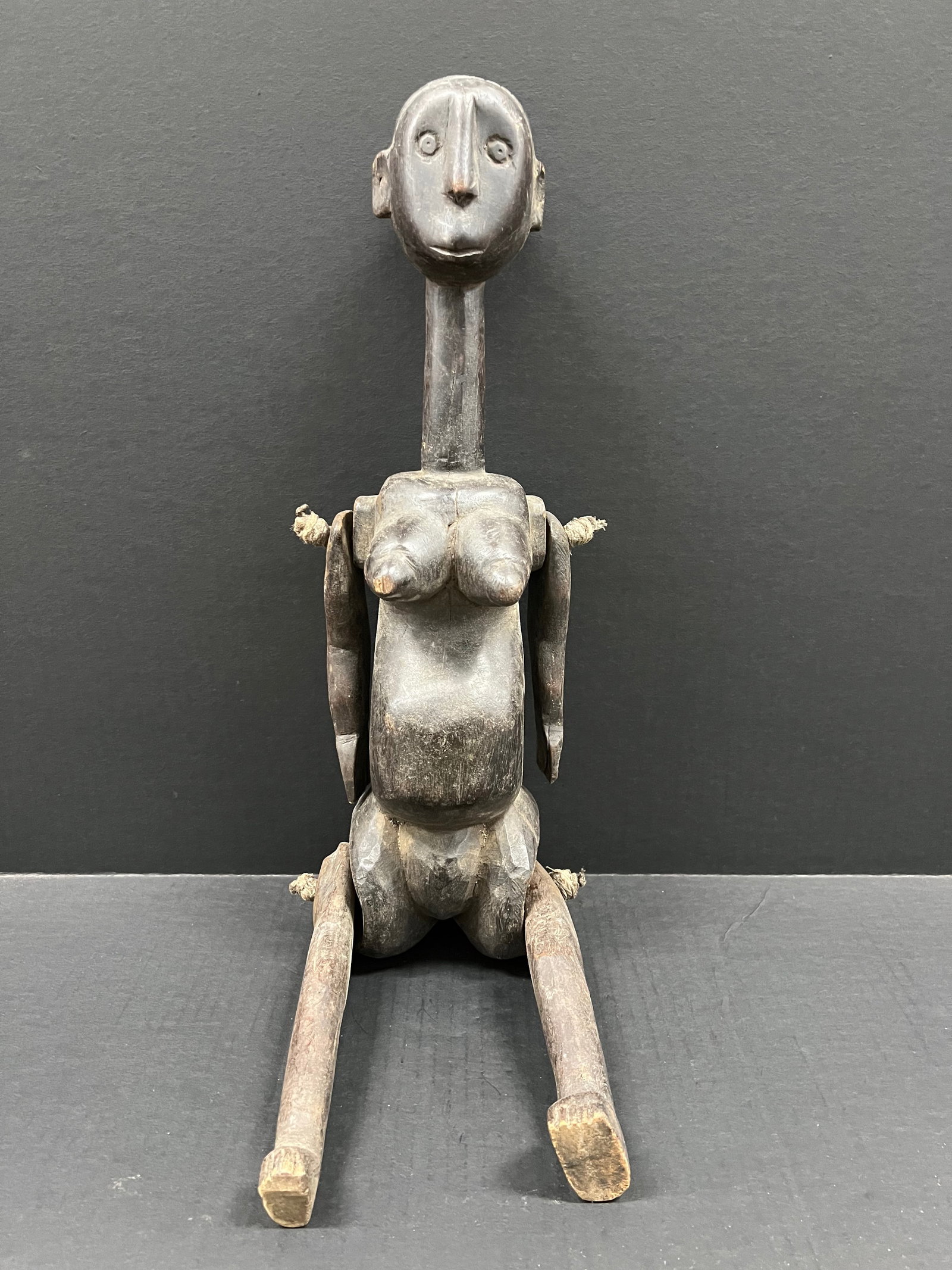 Sukuma Dance Statue: African Tribal Art Carved Wood Sukuma Dance Statue. The dimension is 18 inches high x 11 inches wide. Please be aware that some of the items are vintage, secondhand, old ages, antiques and may have a