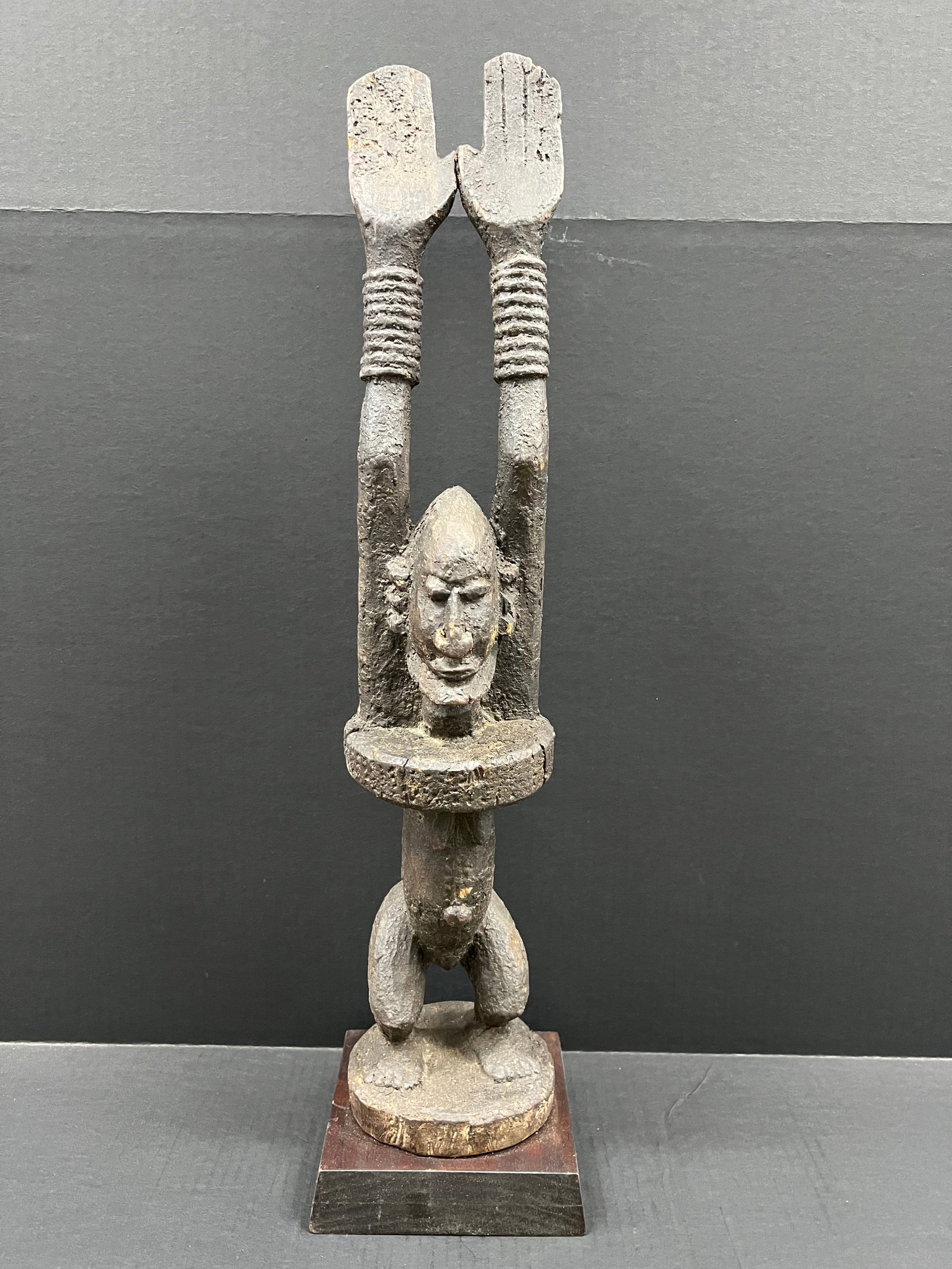 Carved Wood Dogon Statue: African Tribal Art Carved Wood Dogon Statue. The dimension is 27 inches high x 5.5 inches wide. Please be aware that some of the items are vintage, secondhand, old ages, antiques and may have a